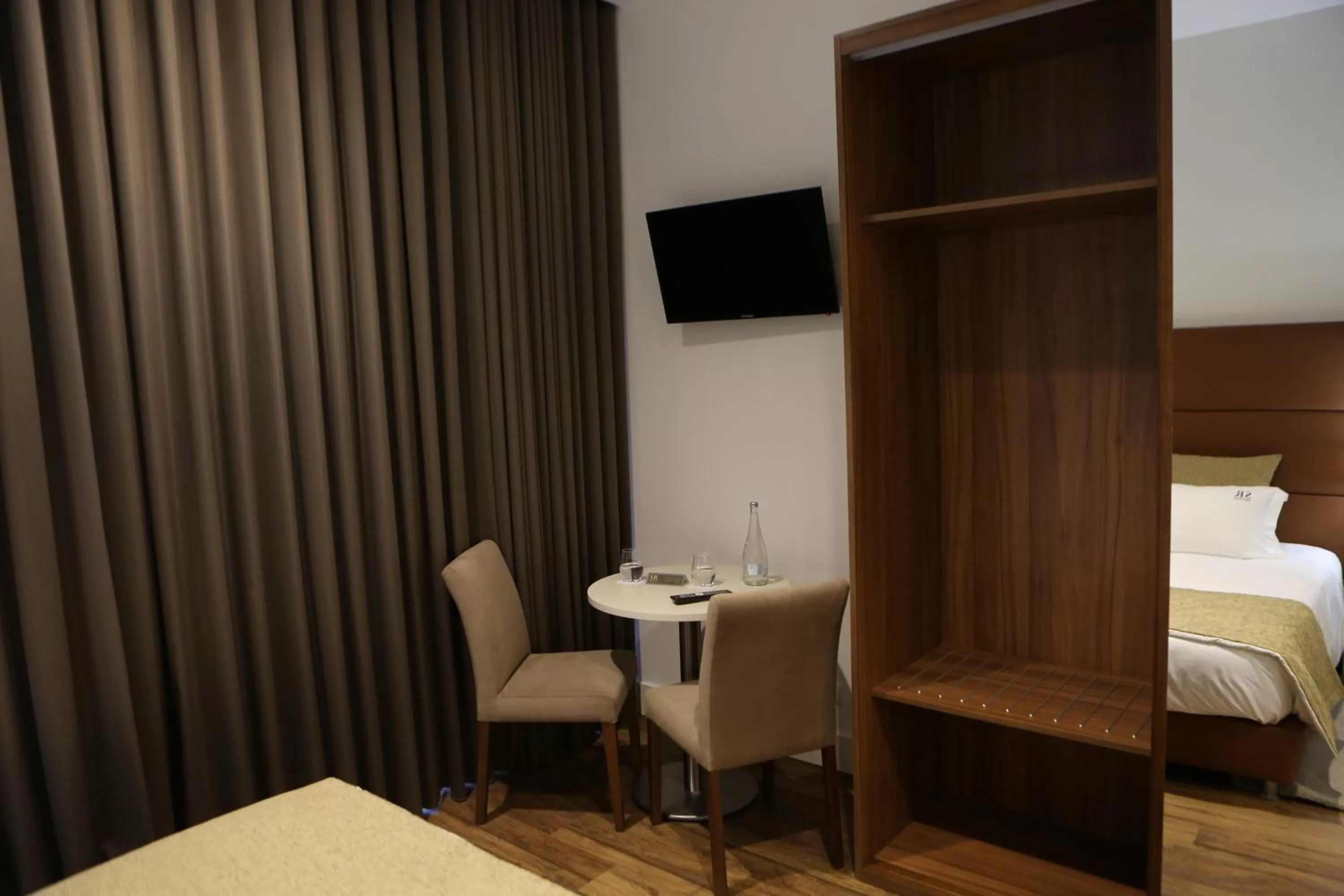 Seating area, Bed in Hotel Solar do Rebolo