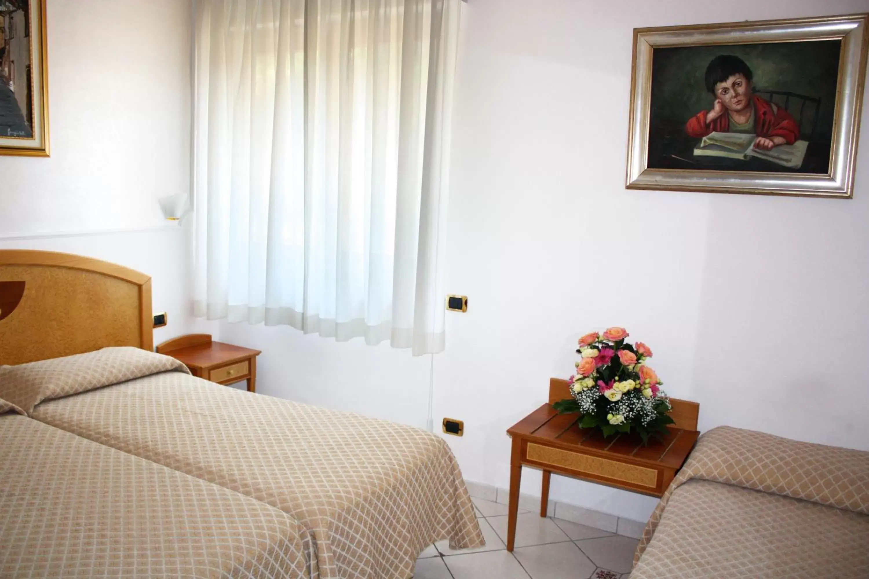 Bed in Hotel Savoia Sorrento