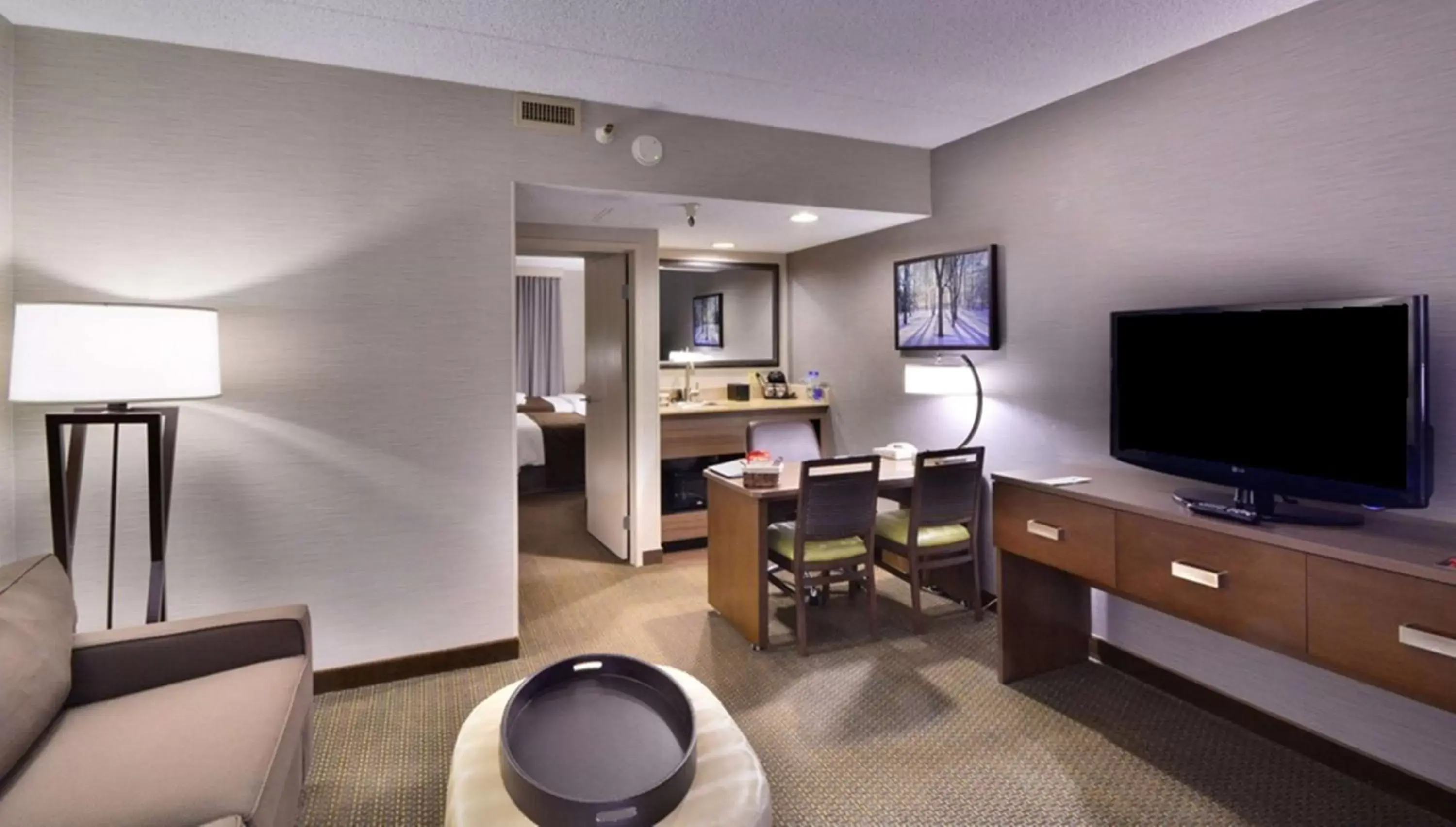 Living room, TV/Entertainment Center in Embassy Suites by Hilton Denver Central Park