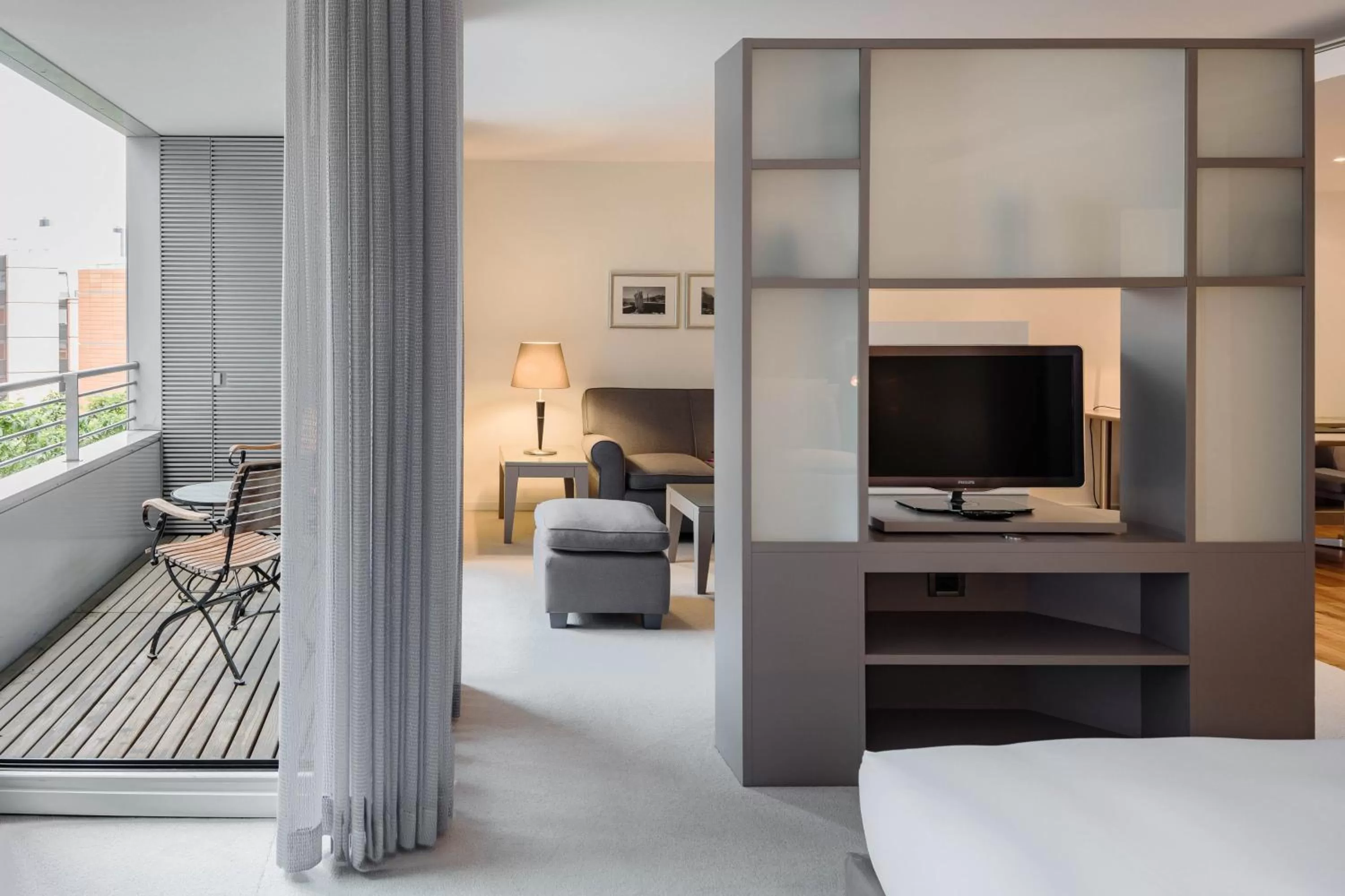 Living room, Bed in The Mandala Berlin, a Member of Design Hotels