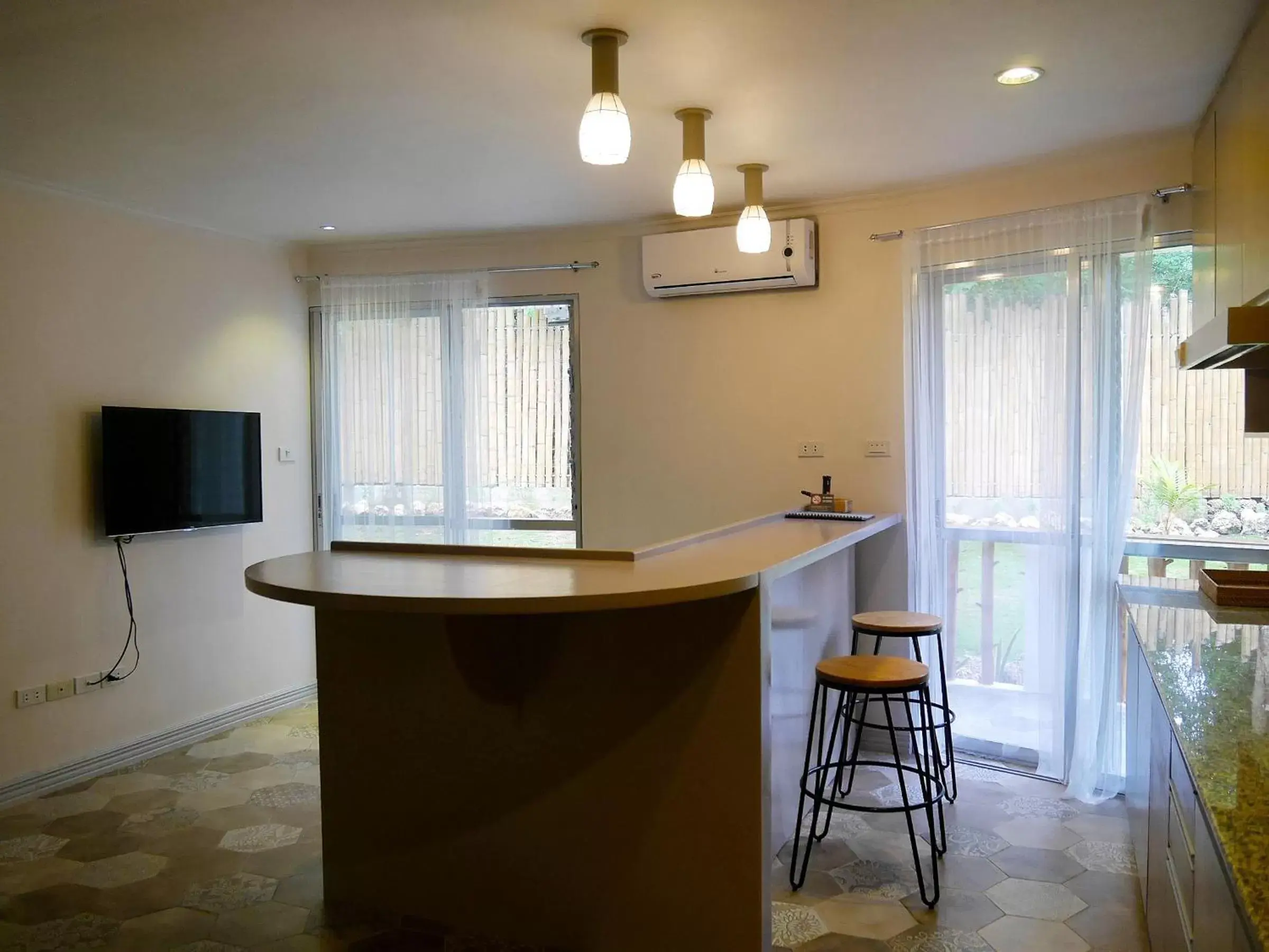 Living room, Kitchen/Kitchenette in Bohol Dreamcatcher Resort