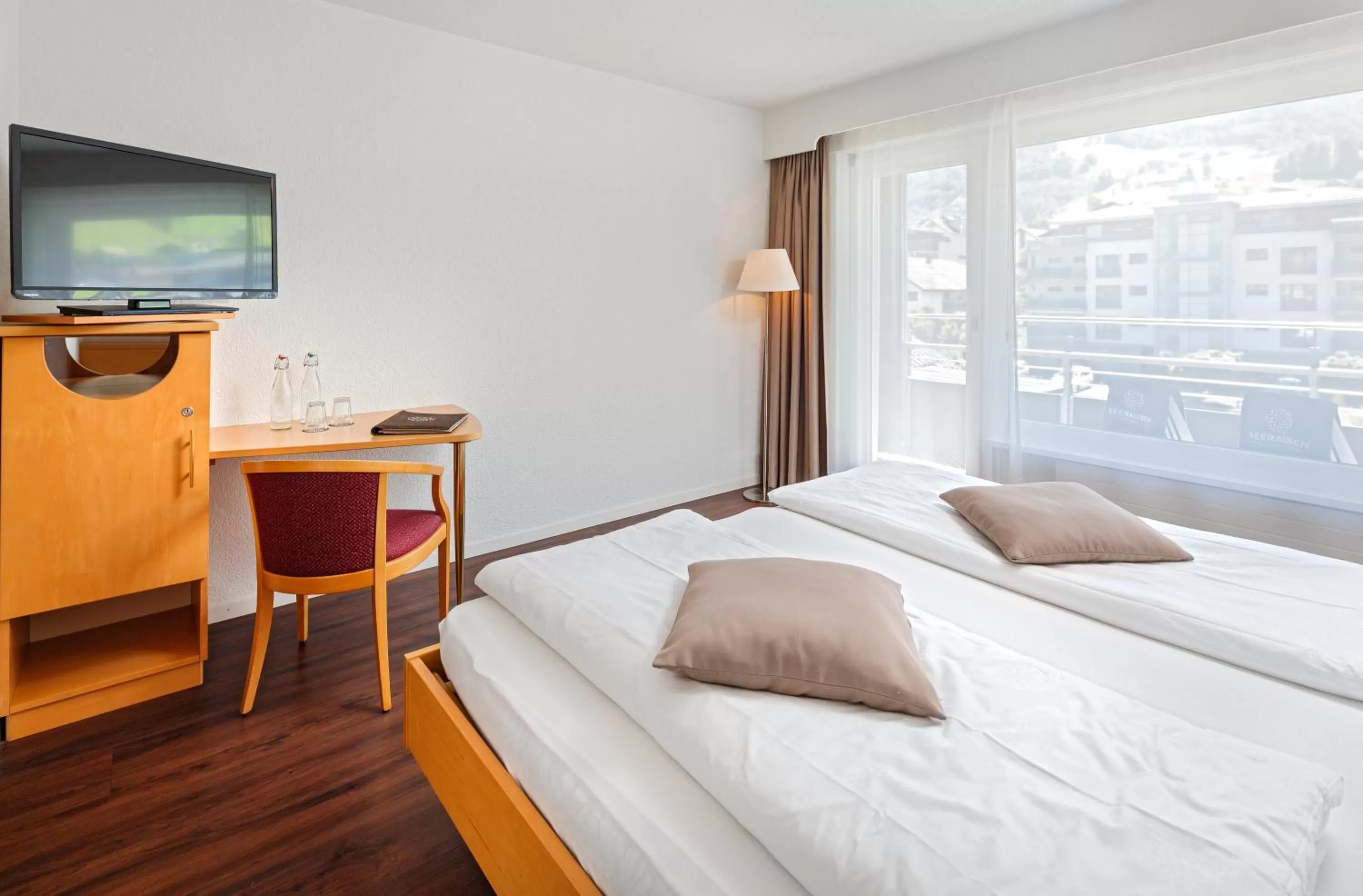 Photo of the whole room, Bed in Seerausch Swiss Quality Hotel