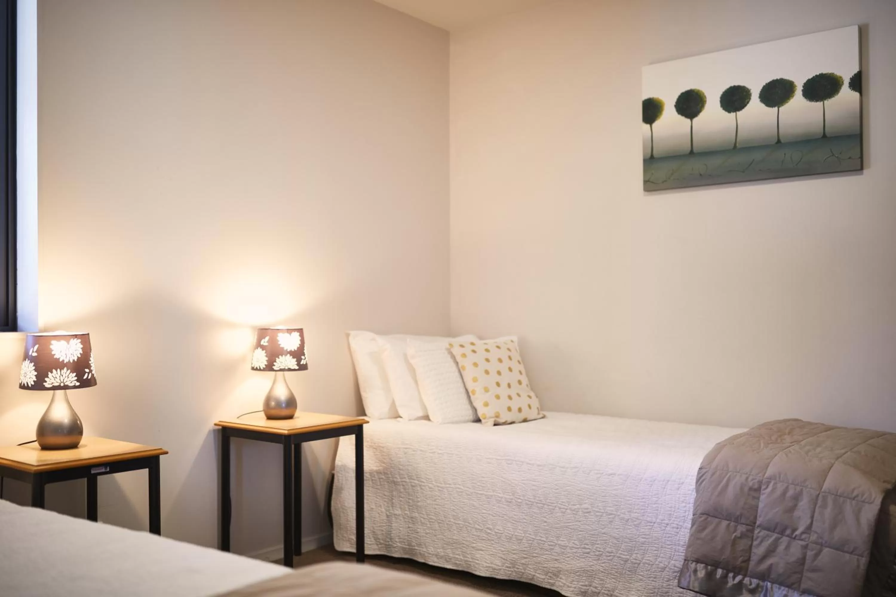 Bed in Blenheim Palms Motel