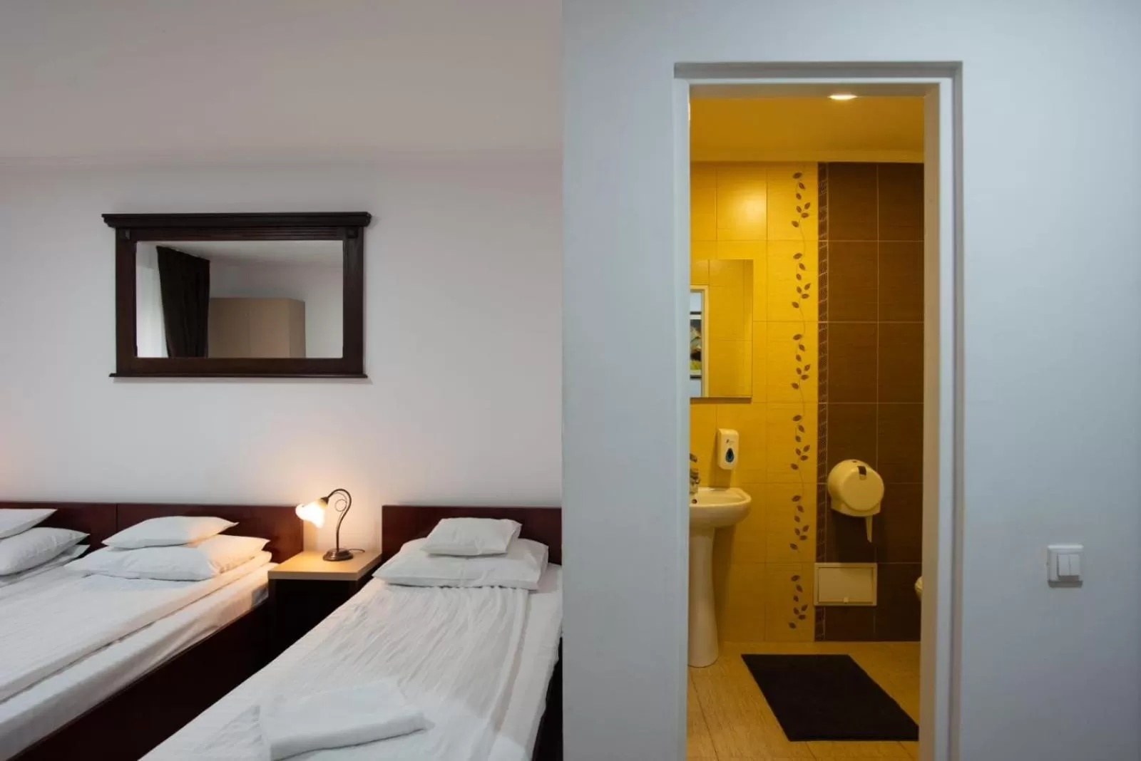 Bed in Carnival City Hotel Oradea