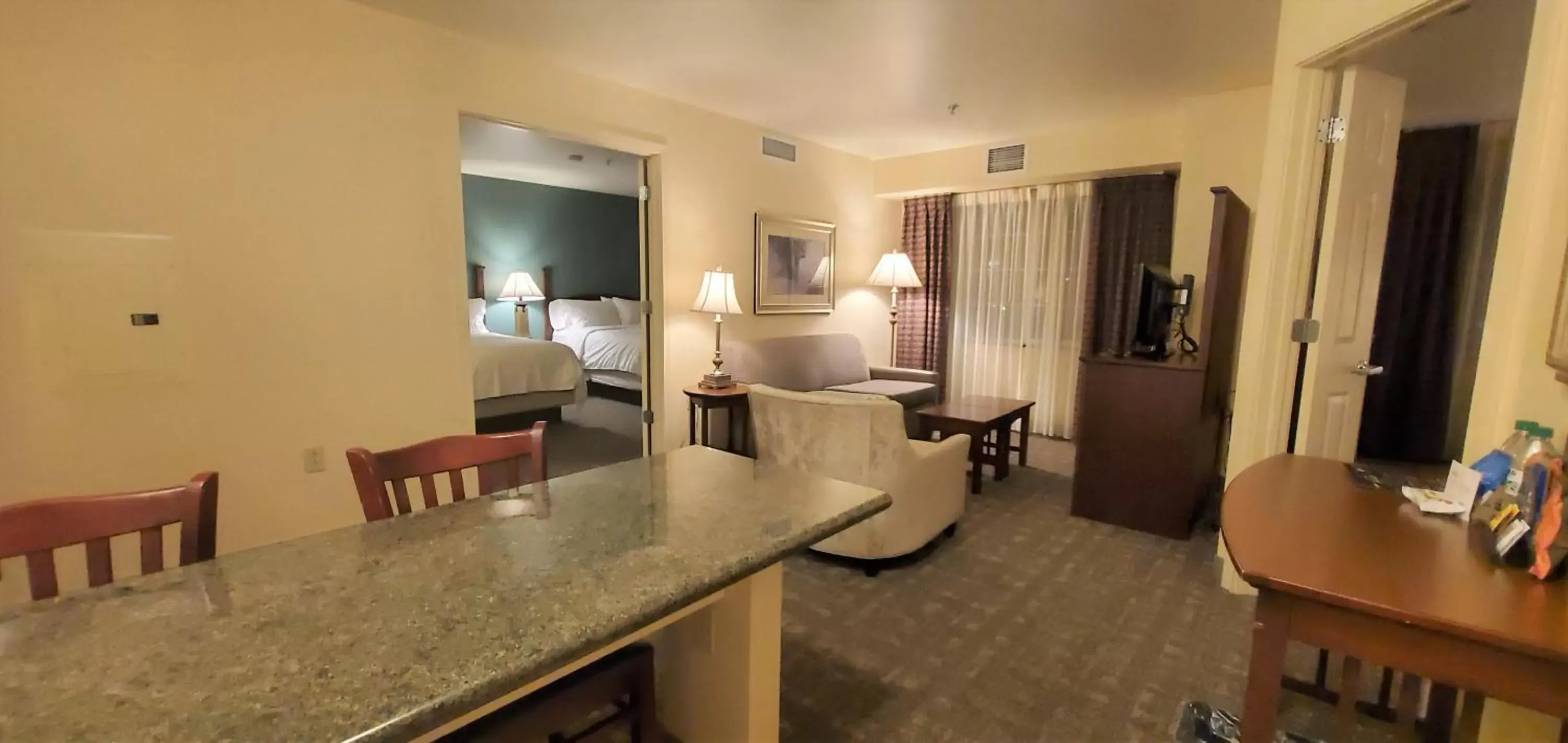 Living room, Dining Area in Staybridge Suites Rochester University, an IHG Hotel