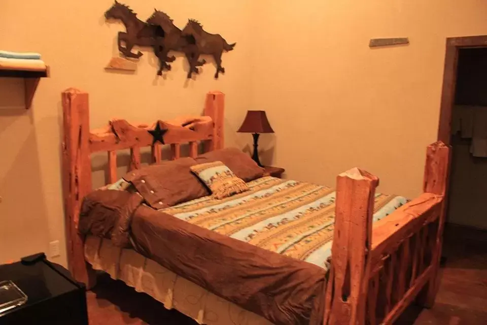Bed in Flying L Ranch Resort & Golf Course Bed in Flying L Ranch Resort & Golf Course
