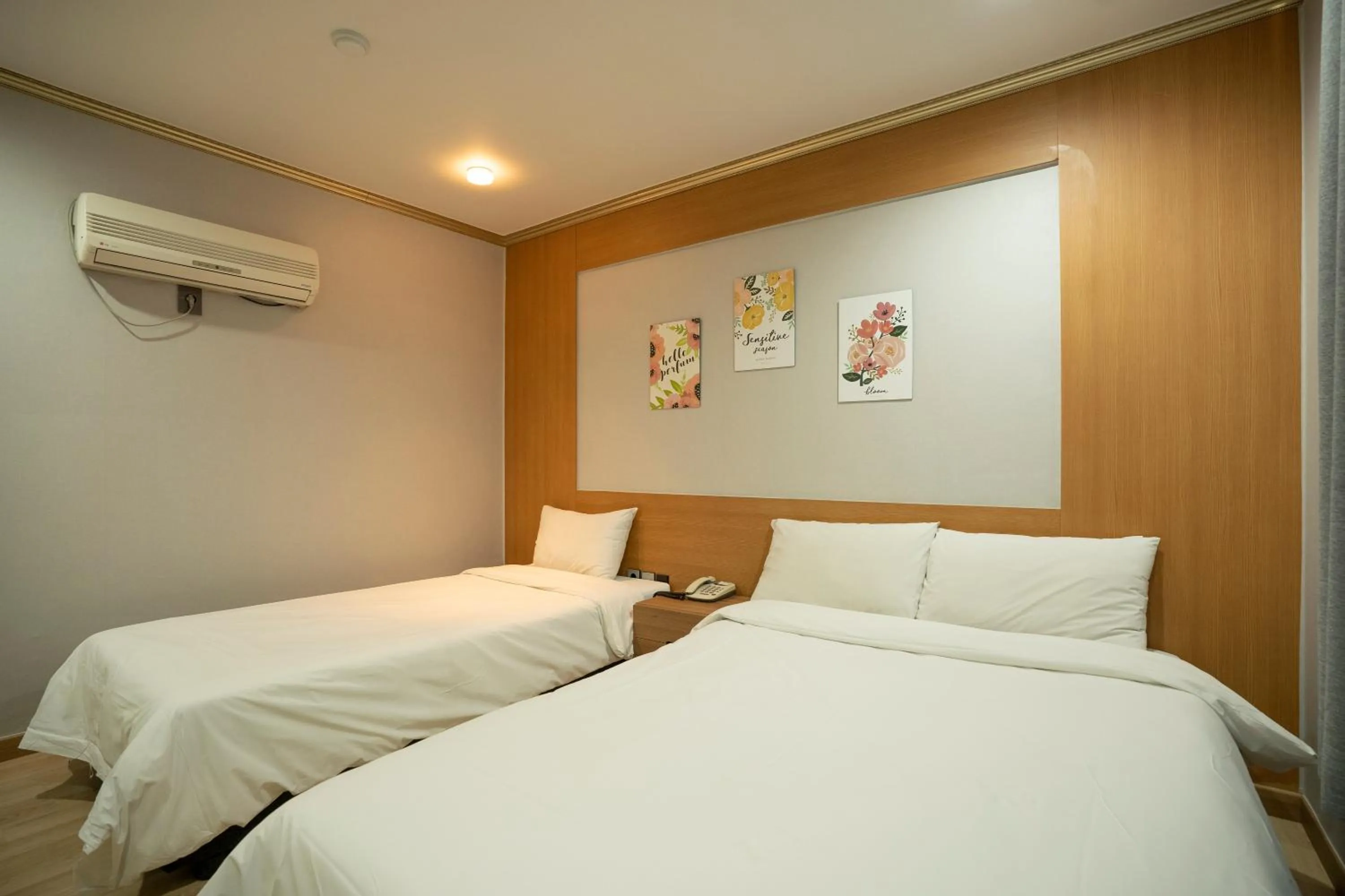 Bed in Jeju Stay Hotel