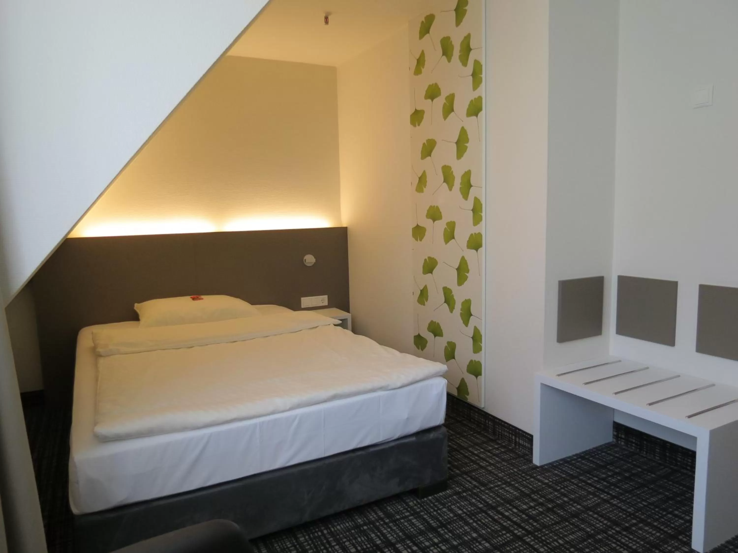Bed in Comfor Hotel Ulm City