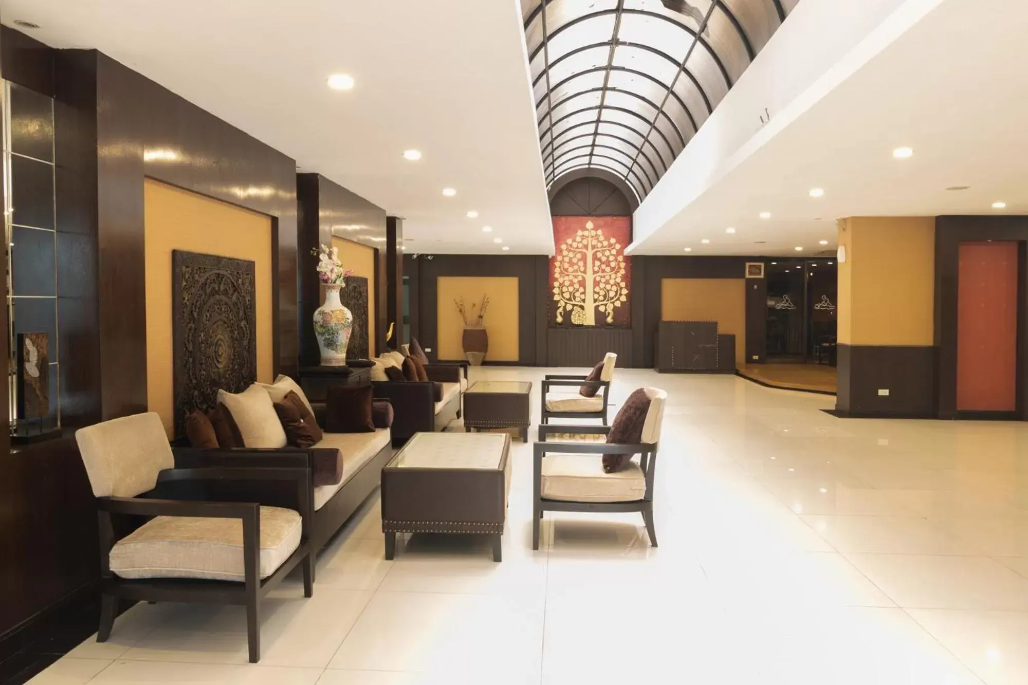 Seating area, Lobby/Reception in Boss Suites Nana Hotel