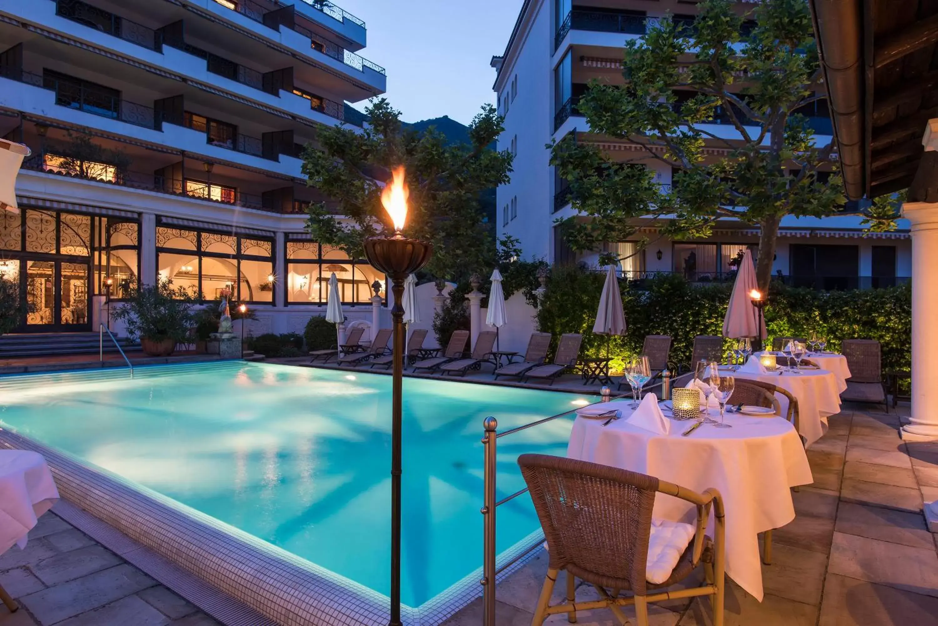 Patio, Swimming Pool in Suiten-Hotel Sunstar Brissago