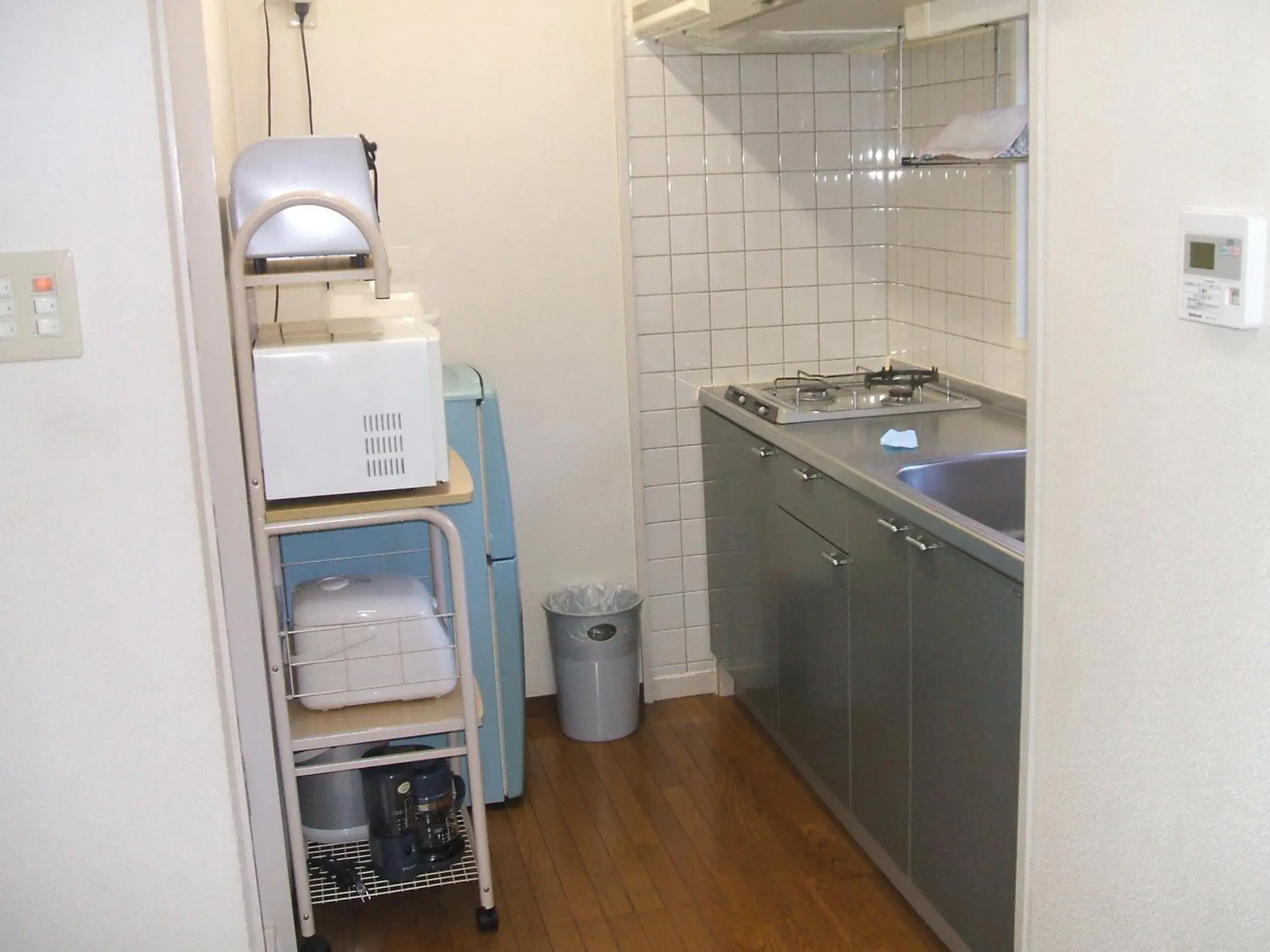 Photo of the whole room, Kitchen/Kitchenette in Weekly Harbourview Mansion Main Building