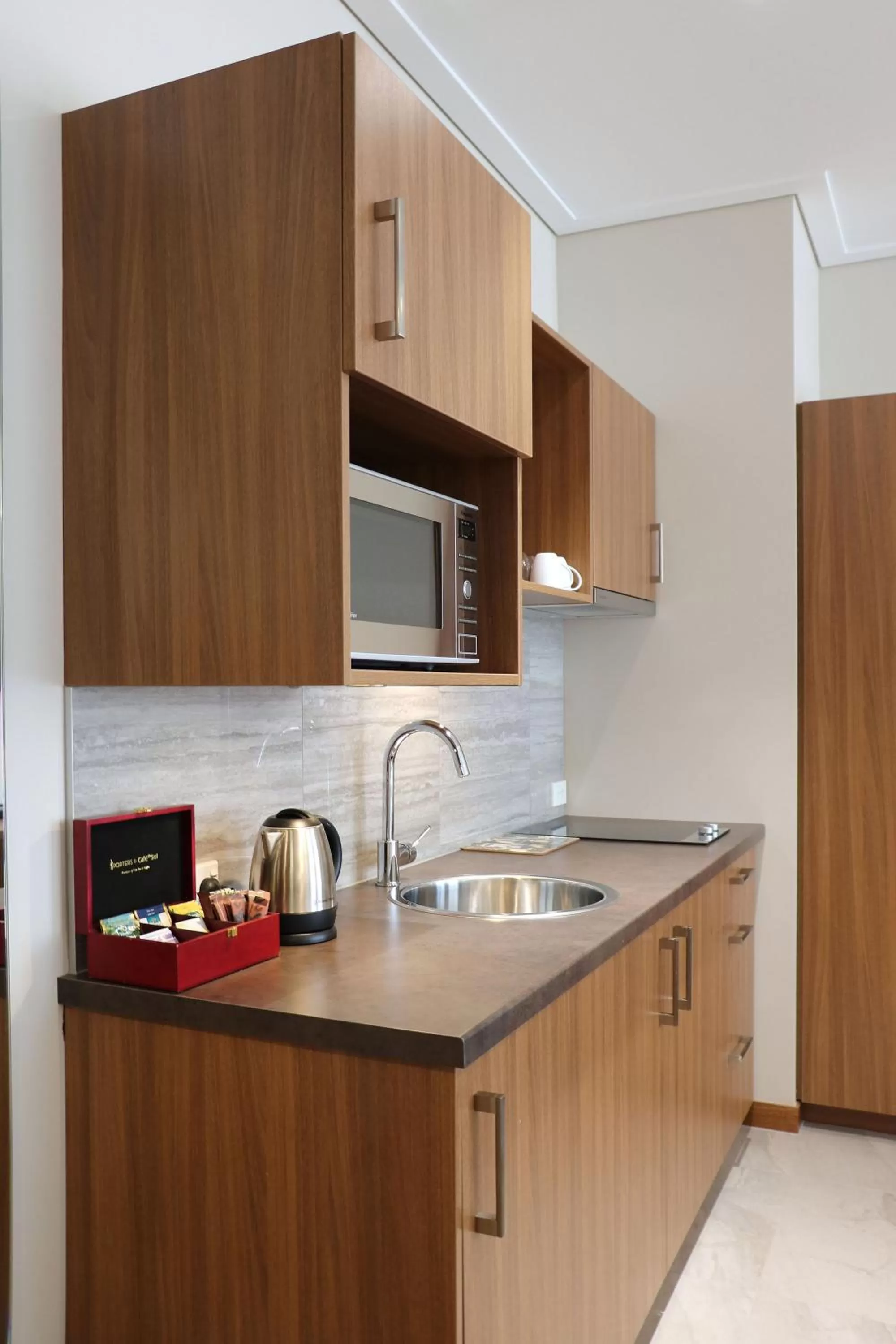 Kitchen or kitchenette in The Victoria Hotel Dunedin