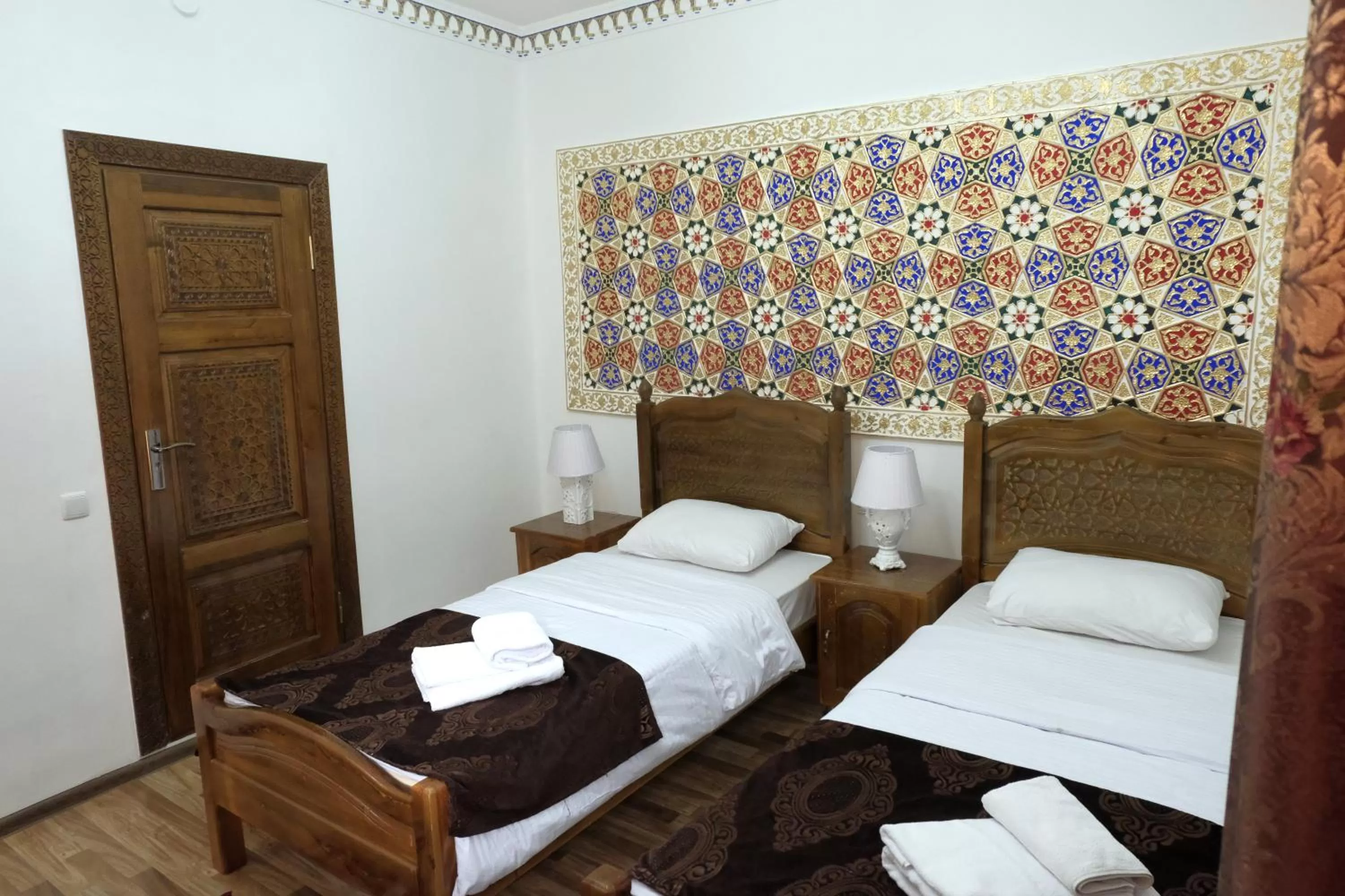 Bed in Bukhara Baraka Boutique Hotel