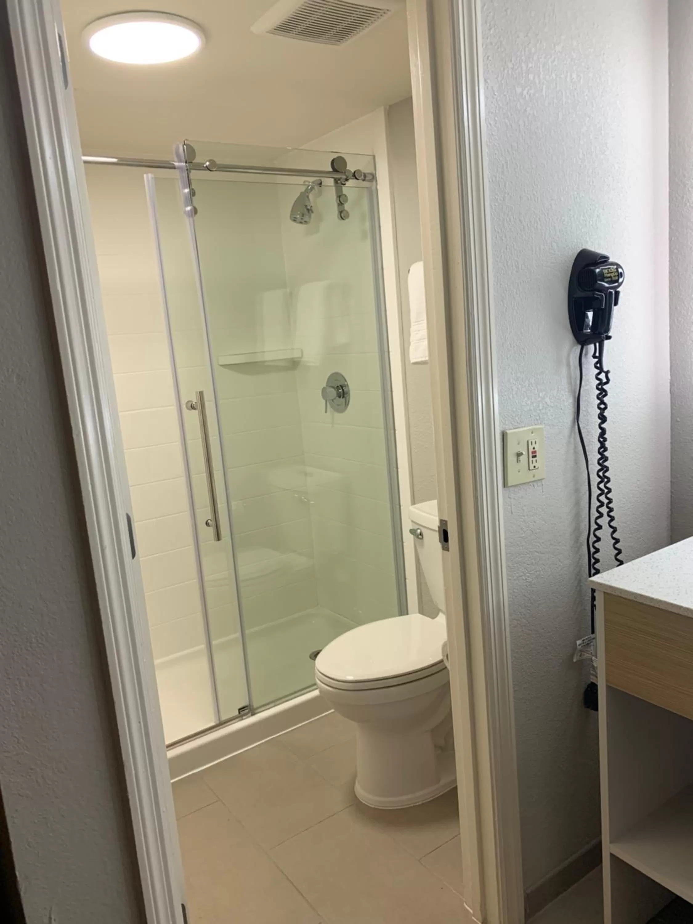 Bathroom in Days Inn by Wyndham Atlanta Stone Mountain