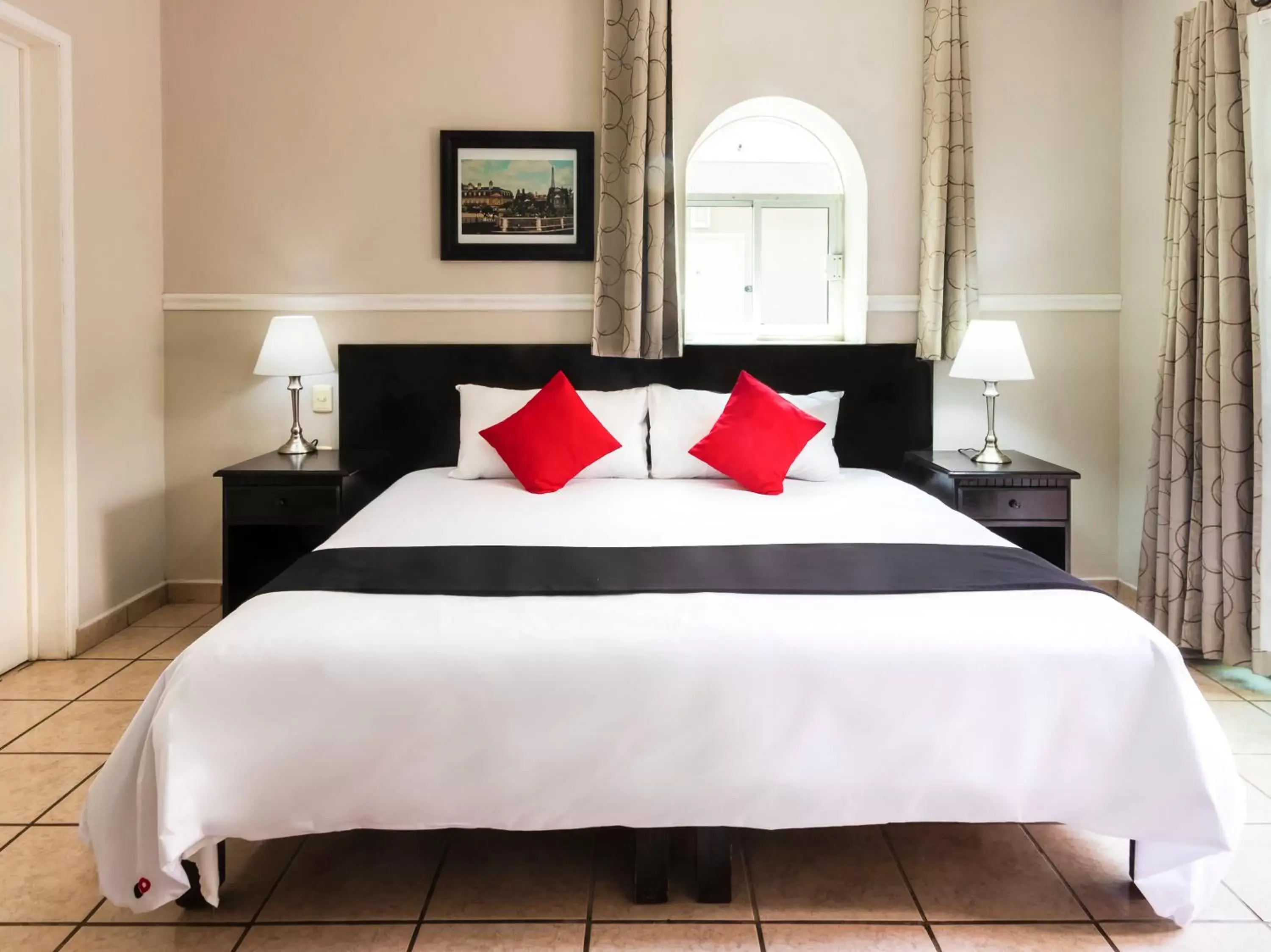 Bed in Boca Inn Hotel & Suites