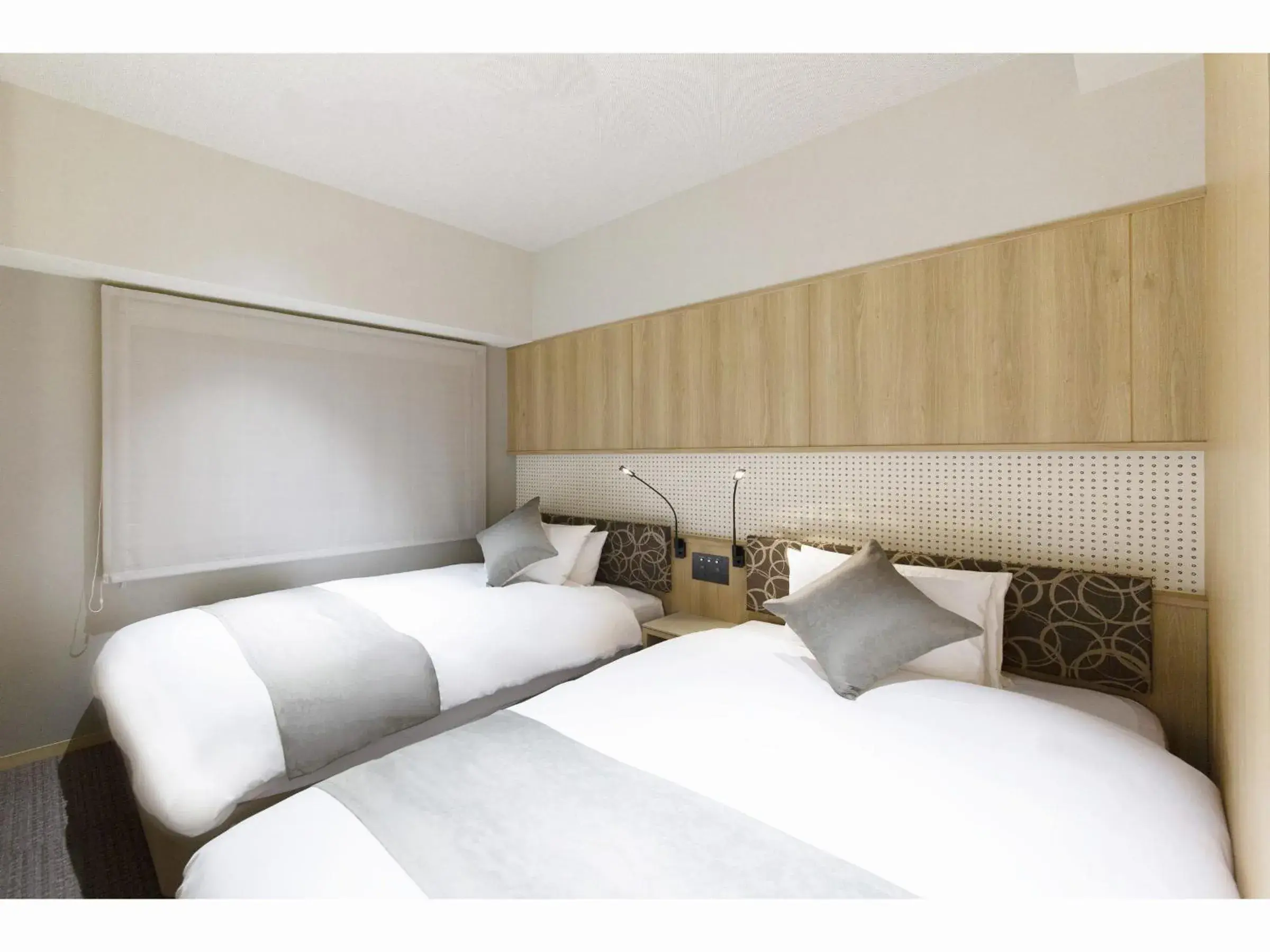 Bed in HOTEL HILLARYS Shinsaibashi
