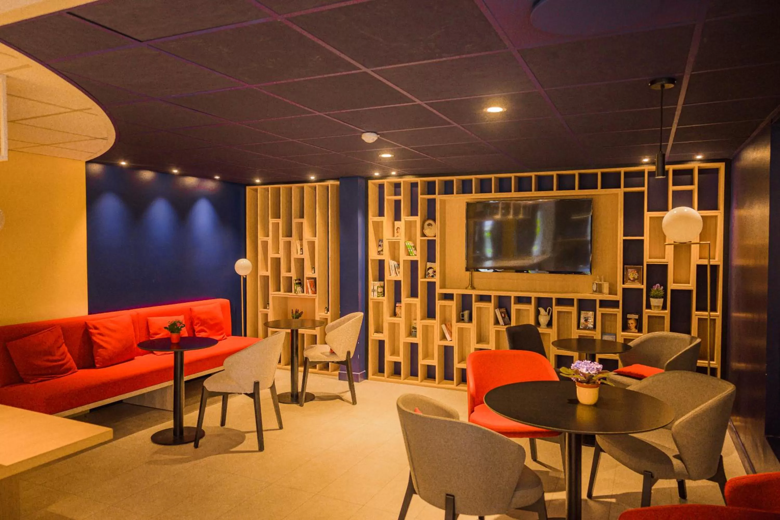 Lounge or bar in ibis Belfort Danjoutin