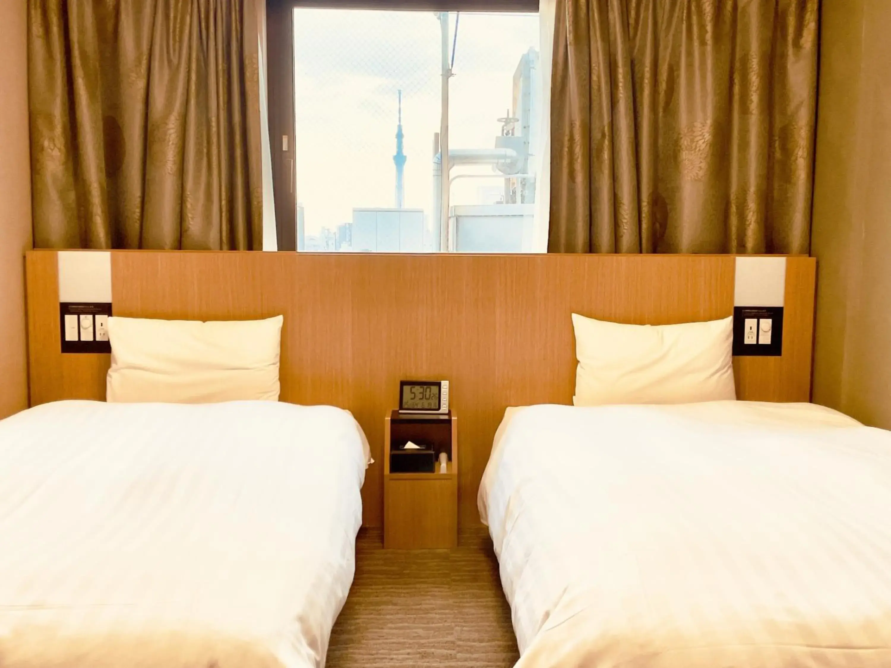 Bed in Dormy Inn Premium Tokyo Kodenmacho