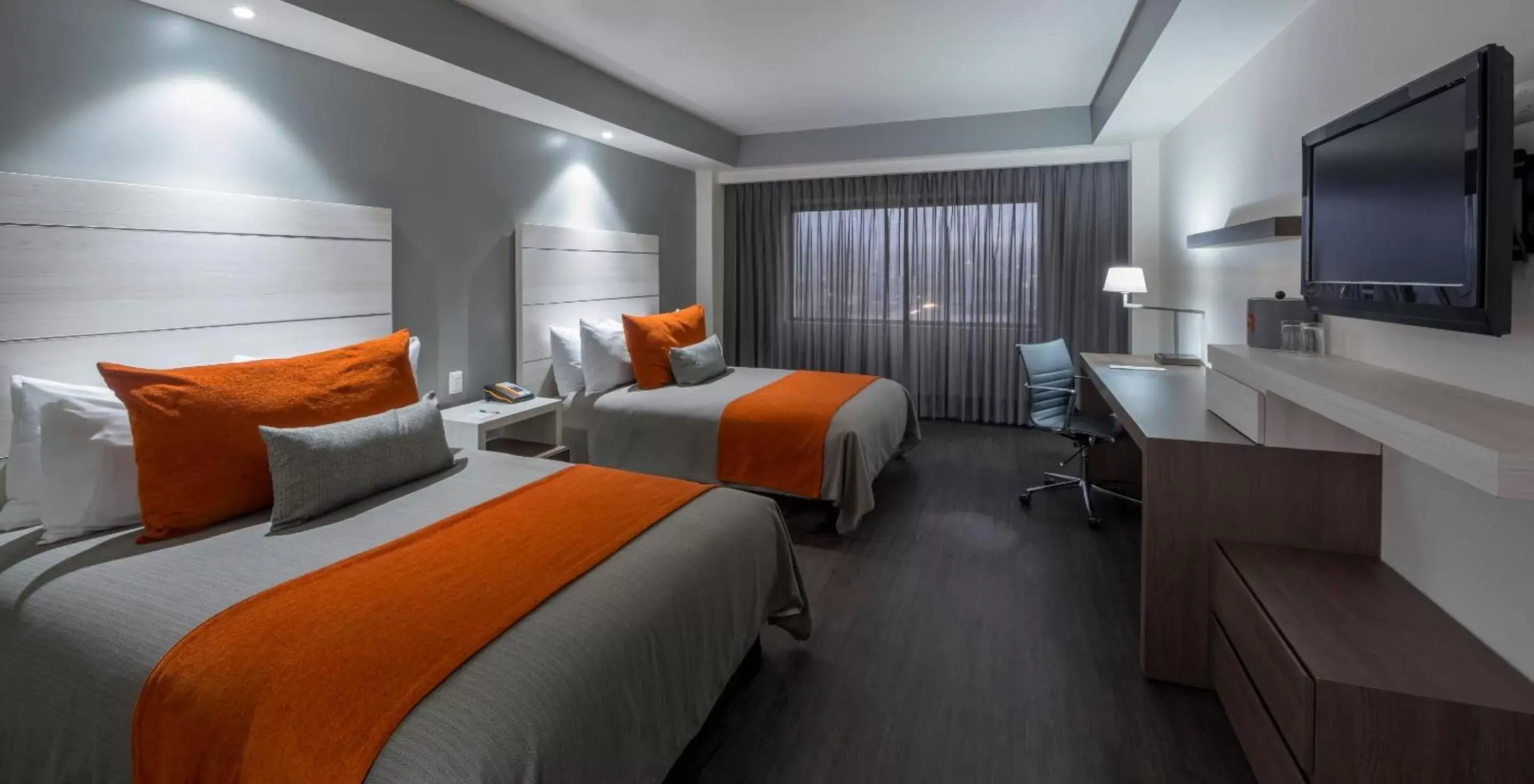 Photo of the whole room, Bed in Real Inn Tijuana by Camino Real Hotels