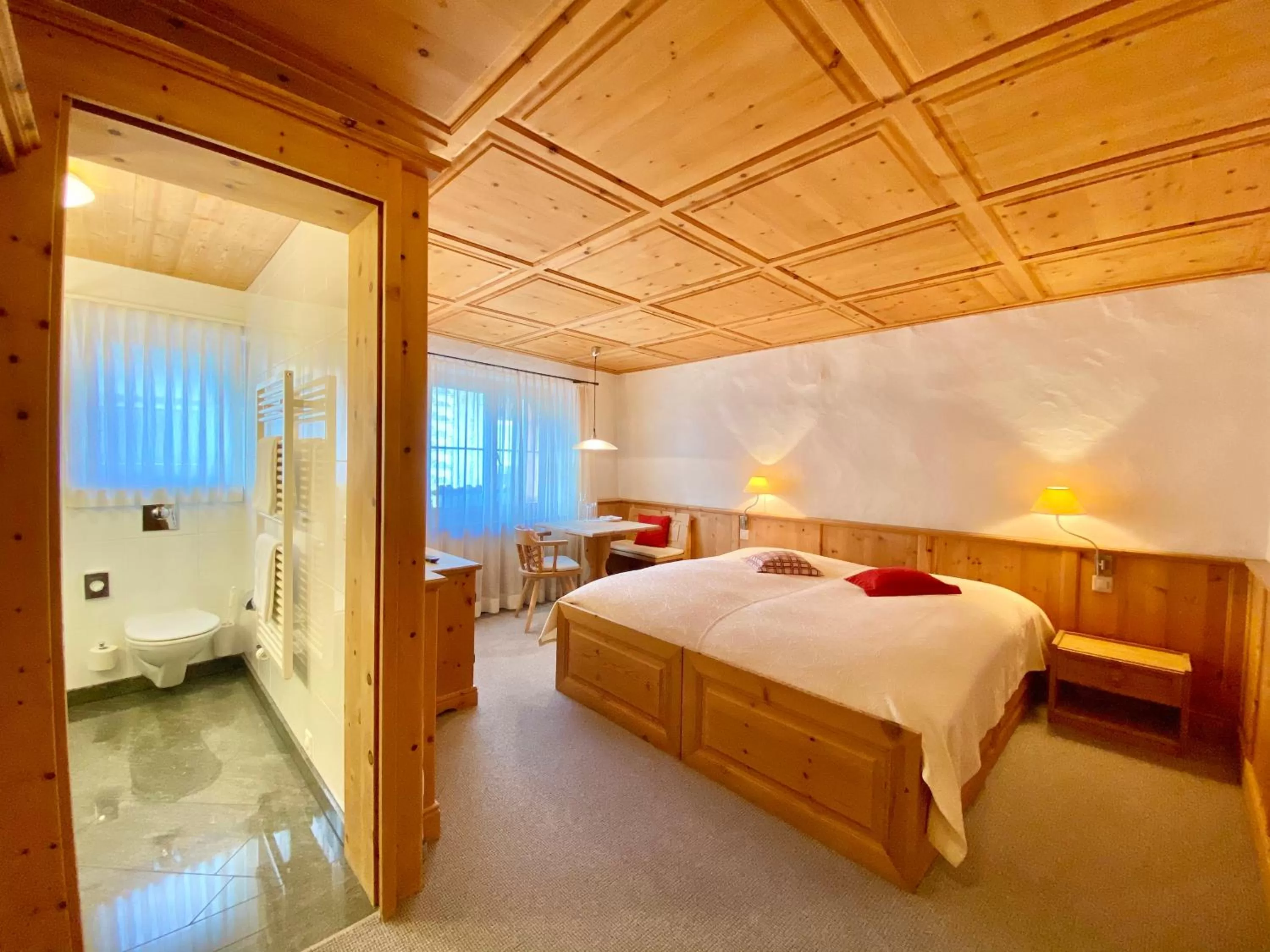 Bed in Hotel Engiadina