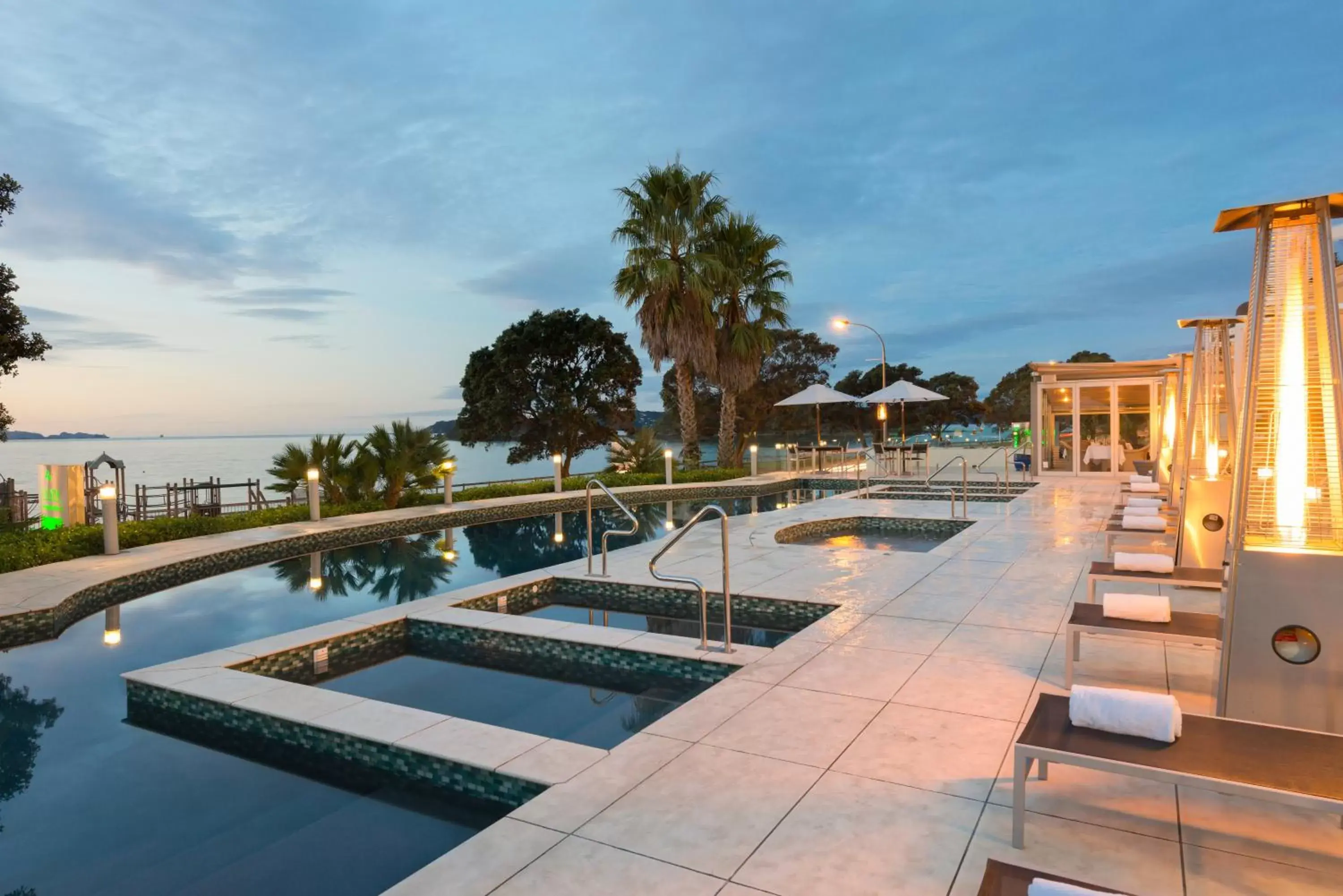 Patio, Swimming Pool in Paihia Beach Resort & Spa Hotel