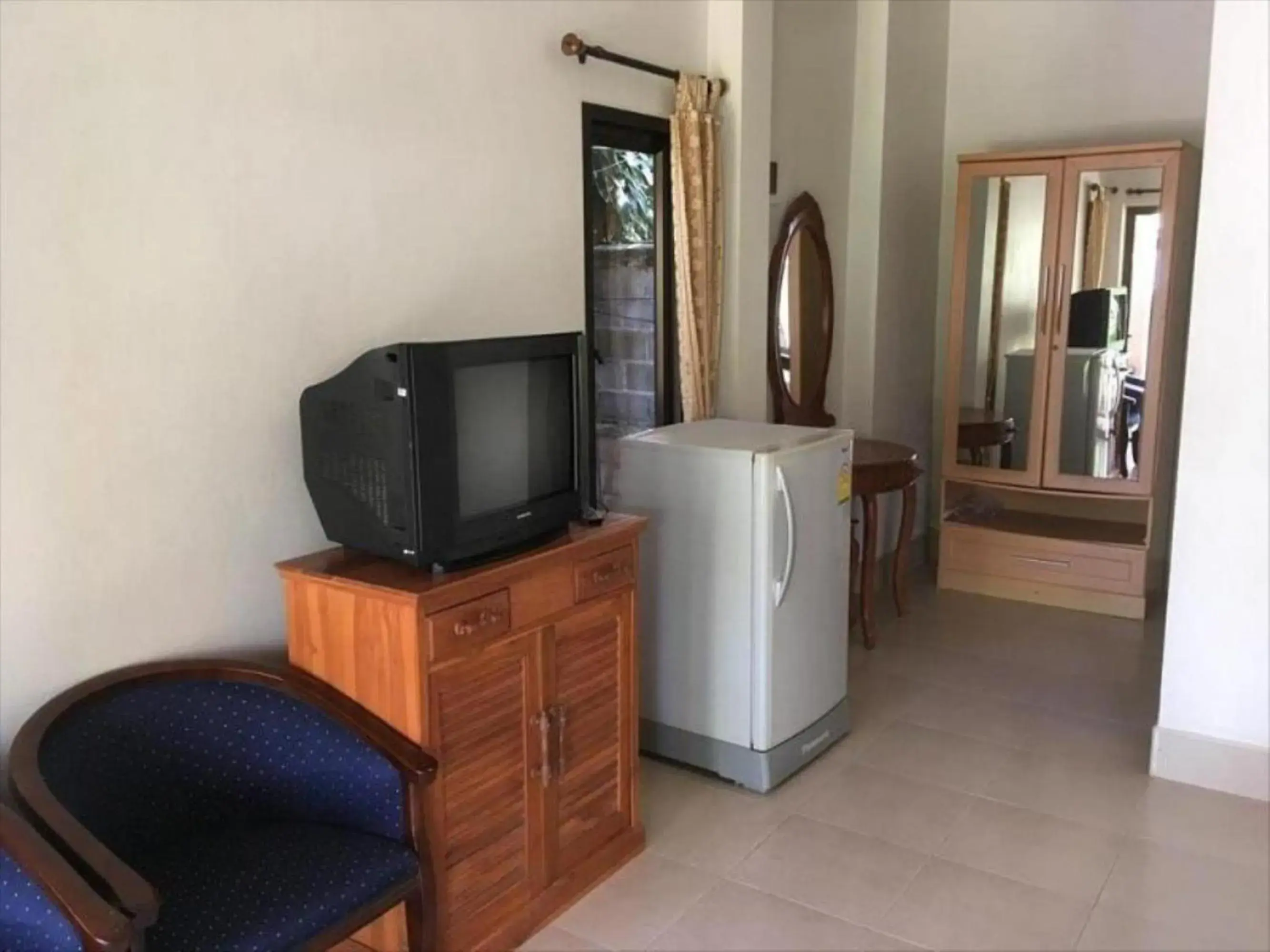 Bedroom, TV/Entertainment Center in Magic Resort