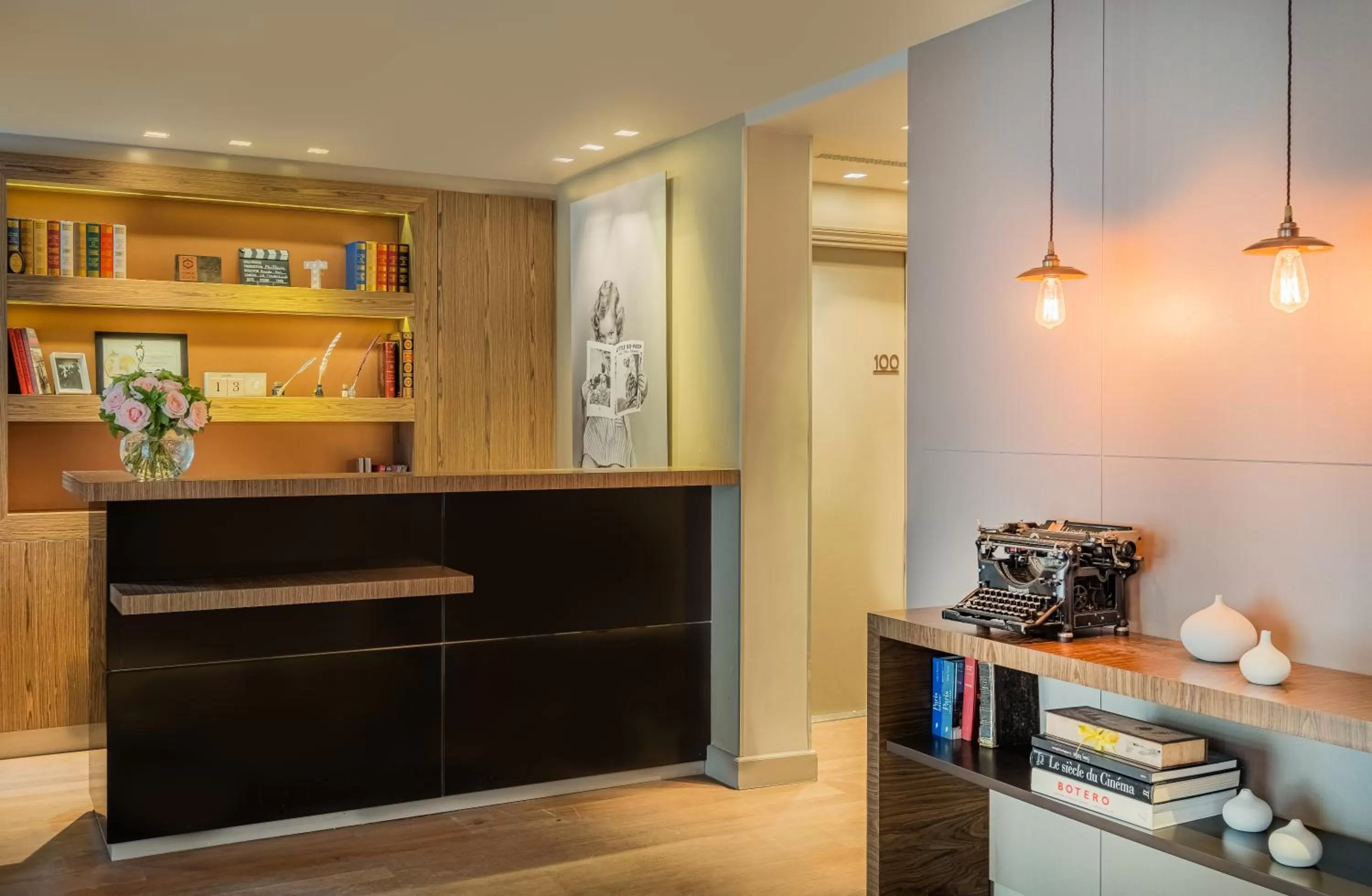 Lobby or reception in Hôtel Le Tourville by Inwood Hotels