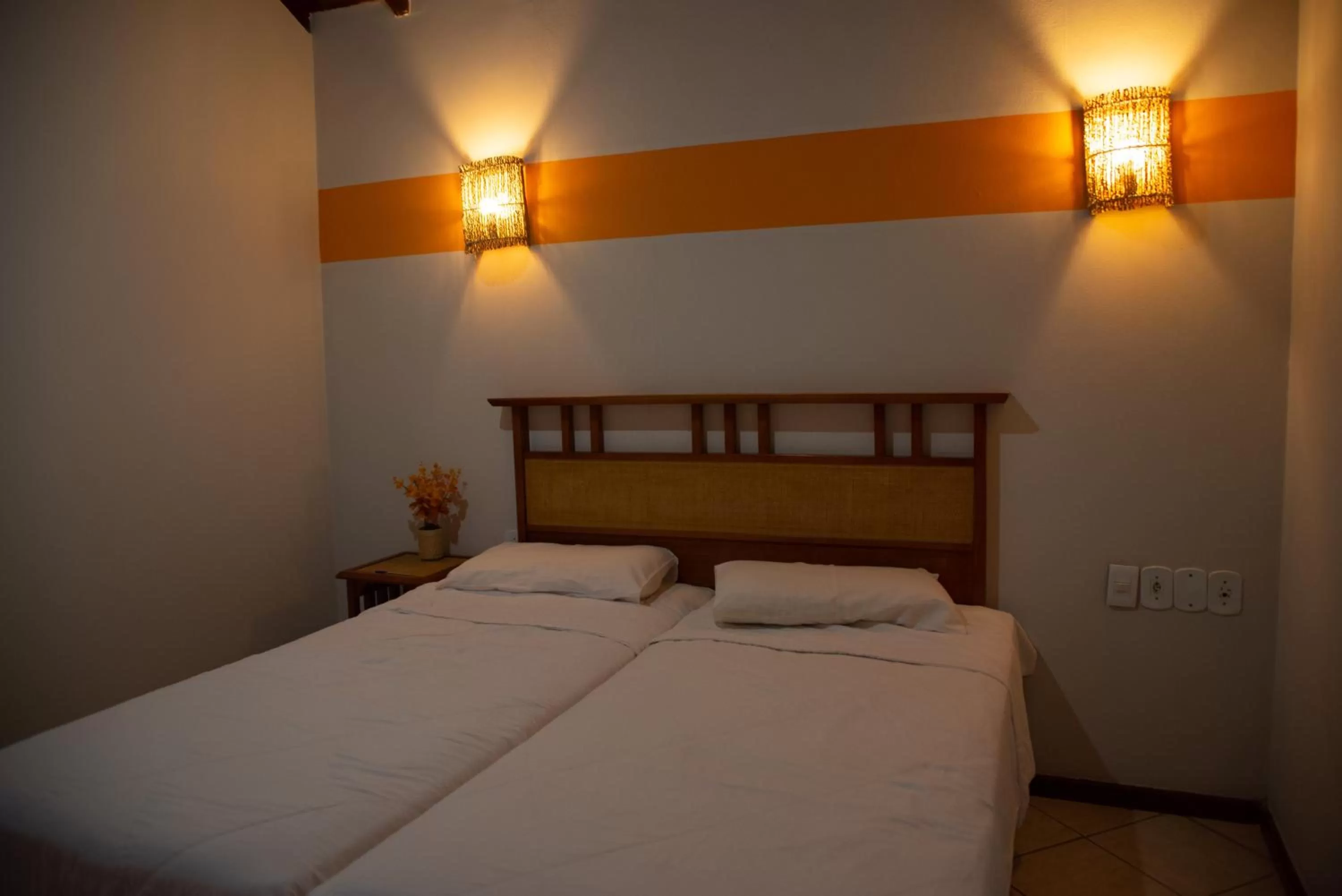 Bed in Pousada dos Guardiões