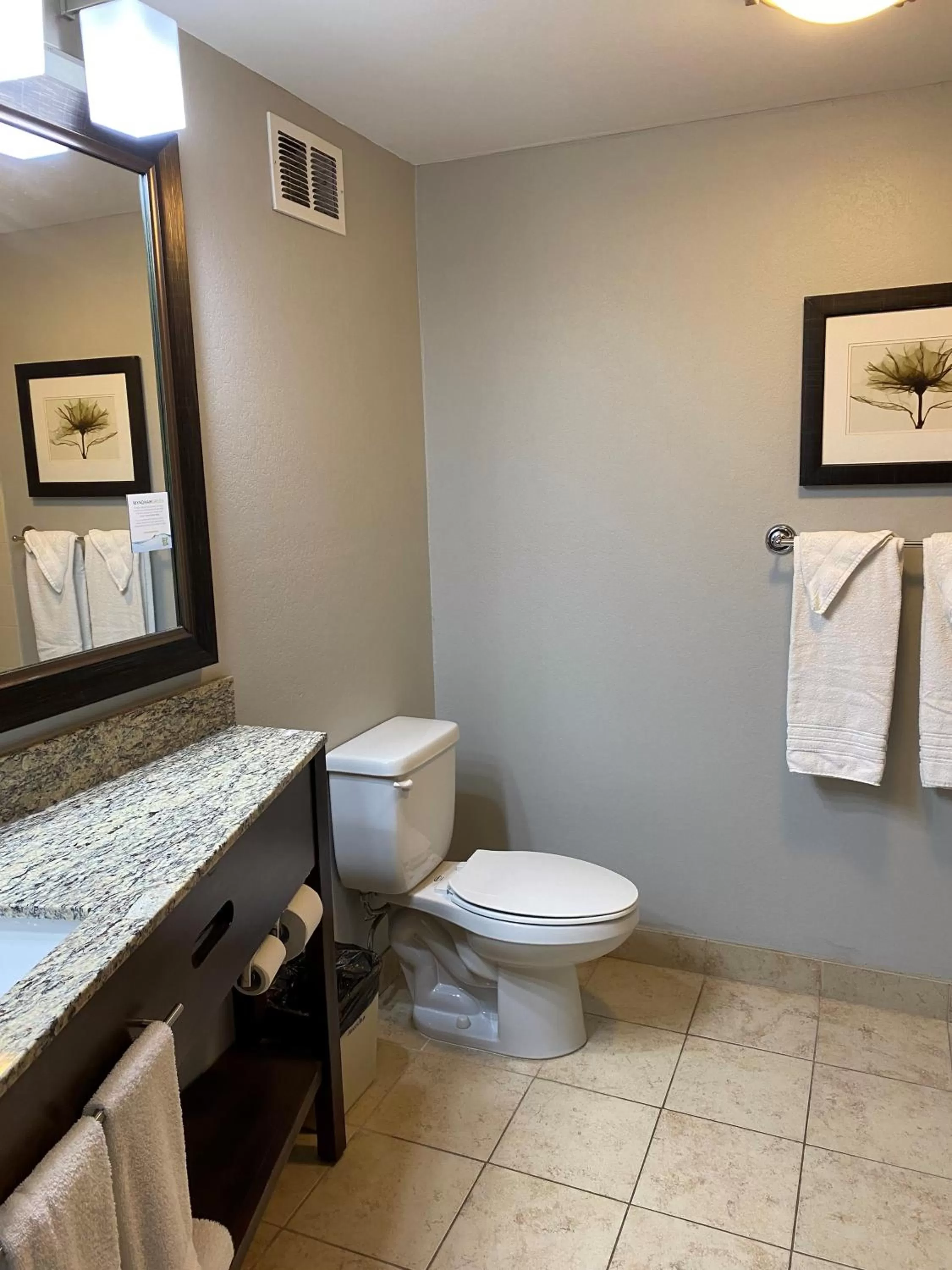 Bathroom in AmericInn by Wyndham Algona