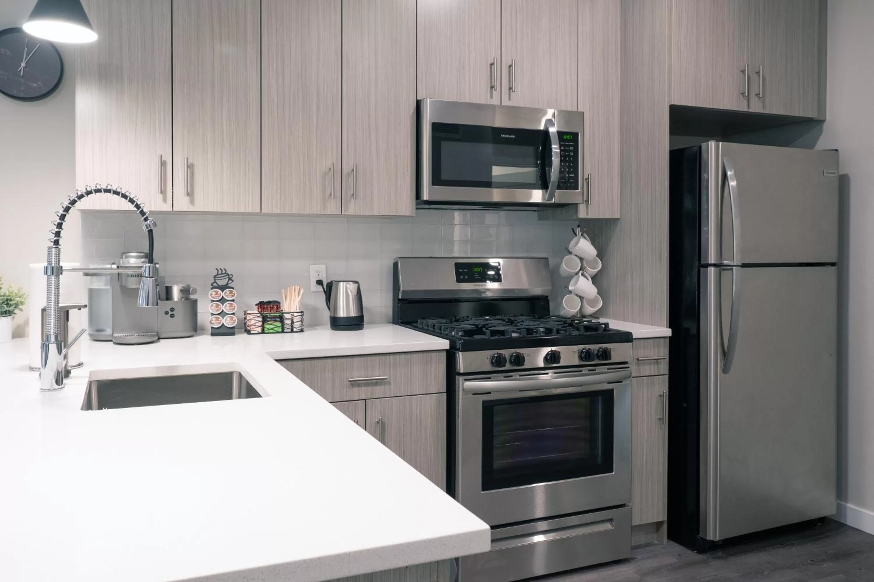 Kitchen or kitchenette in Luxury Furnished Apartments by Hyatus Downtown at Yale
