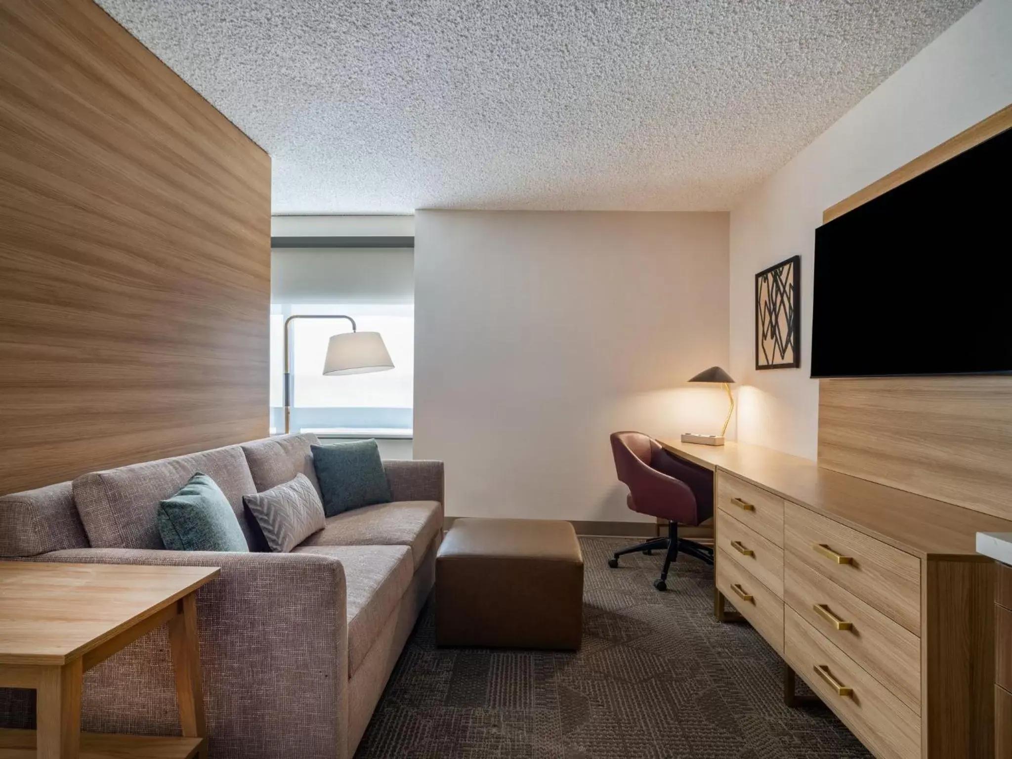 Bedroom, Seating Area in Staybridge Suites Chicago O'Hare - Rosemont, an IHG Hotel