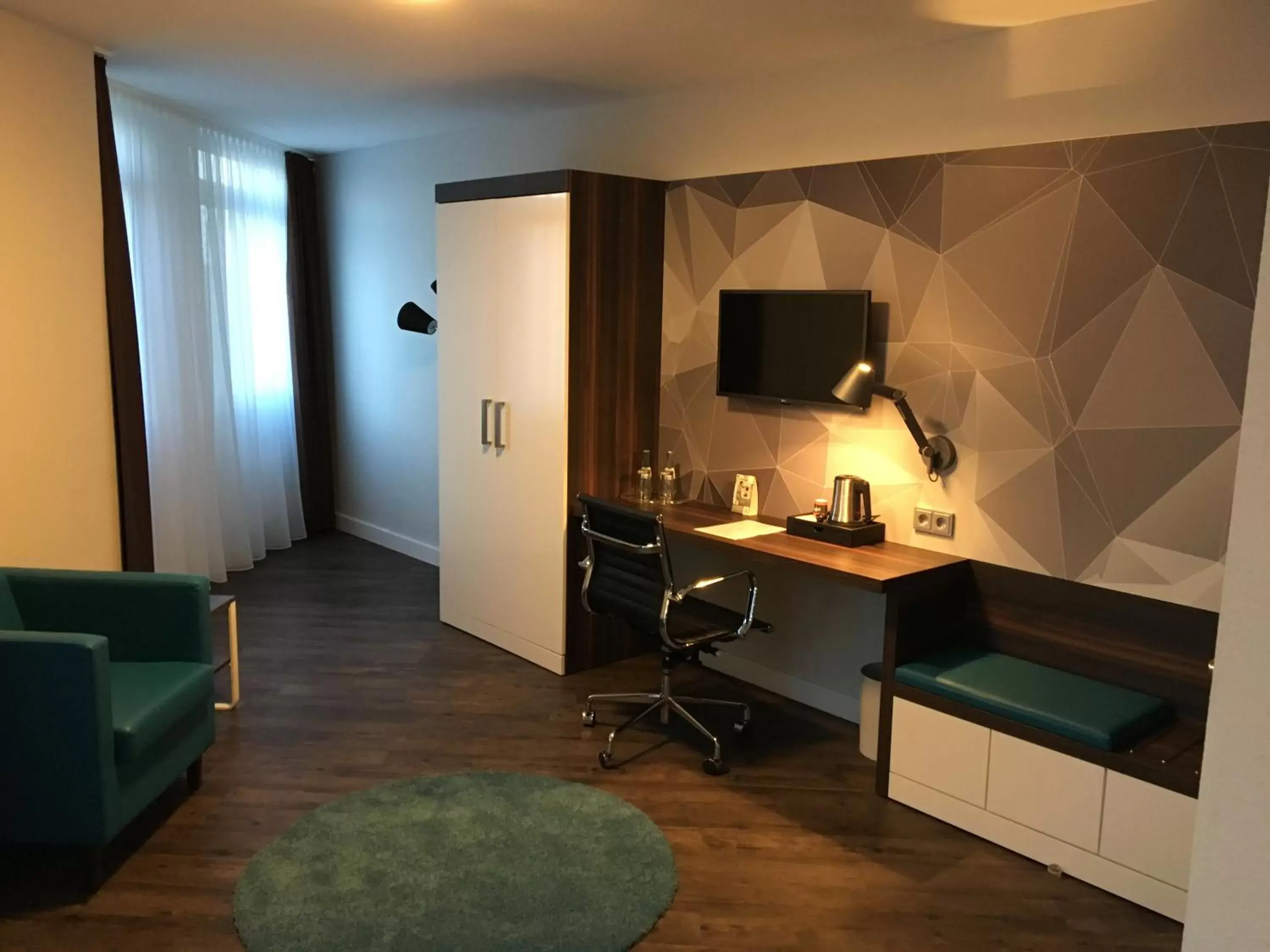 TV and multimedia, TV/Entertainment Center in Best Western Hotel Mannheim City