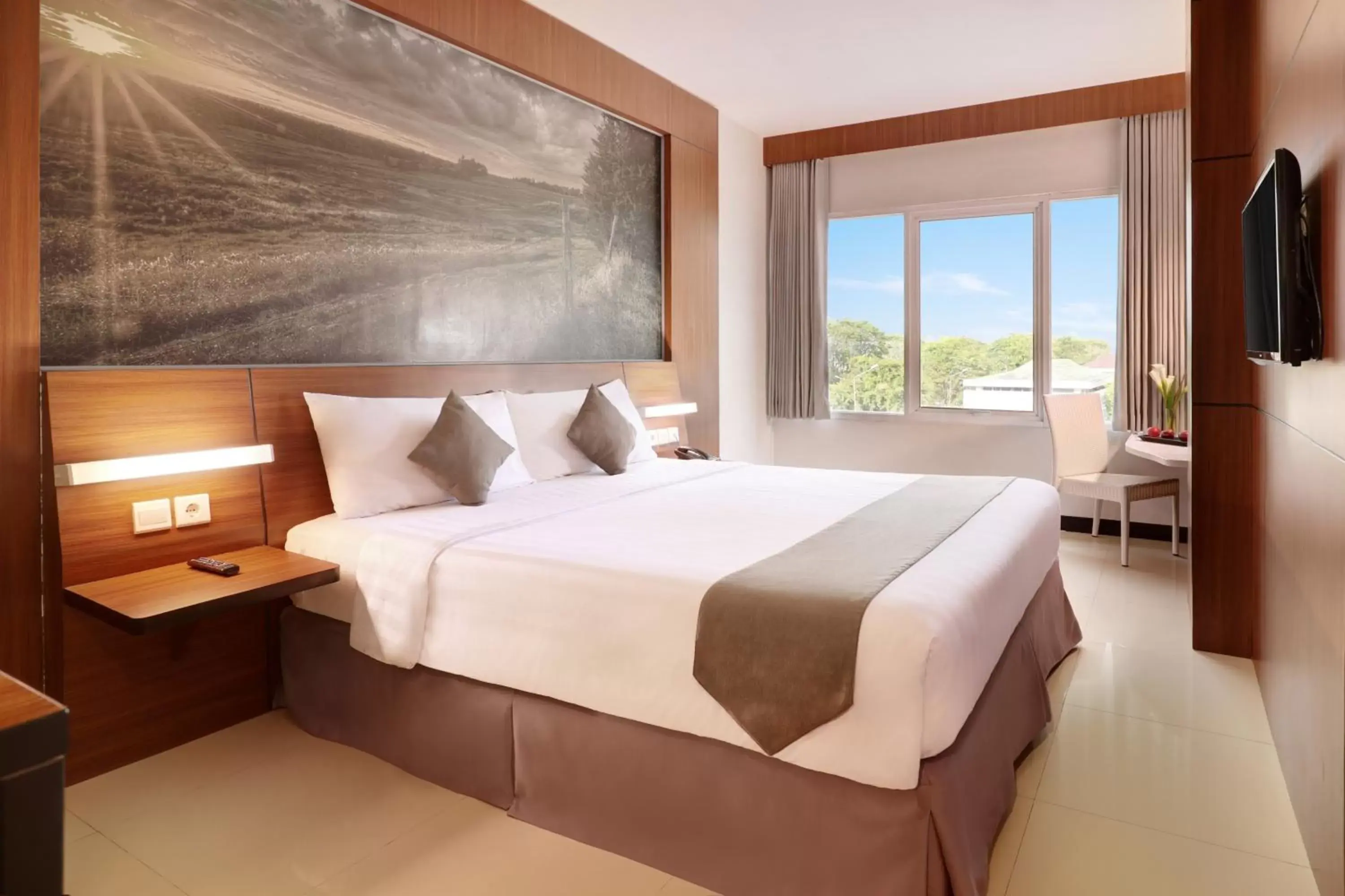 Bedroom, Bed in Hotel Neo Palma Palangkaraya by ASTON
