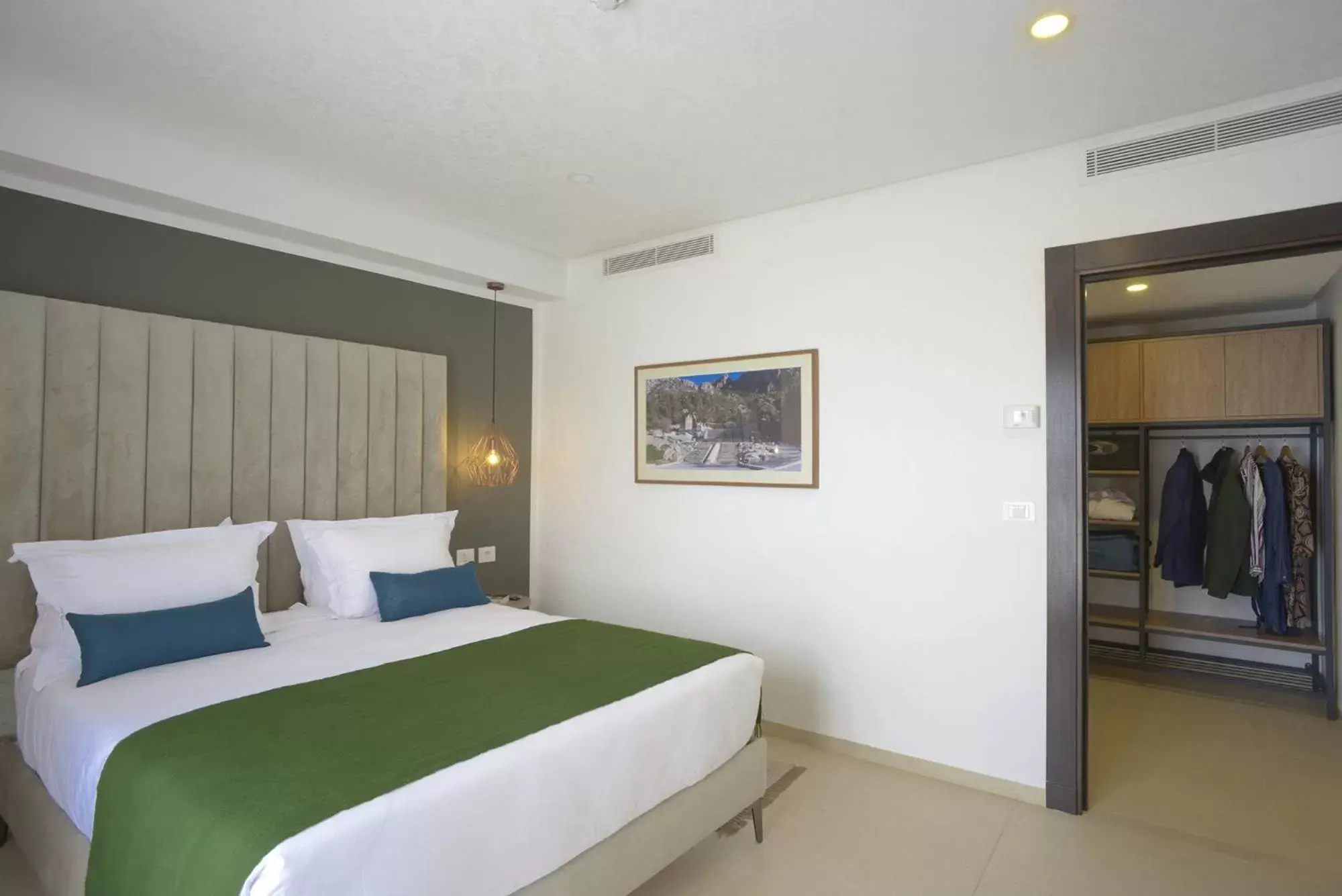 Bed in MAIA HOTEL SUITES Bed in MAIA HOTEL SUITES