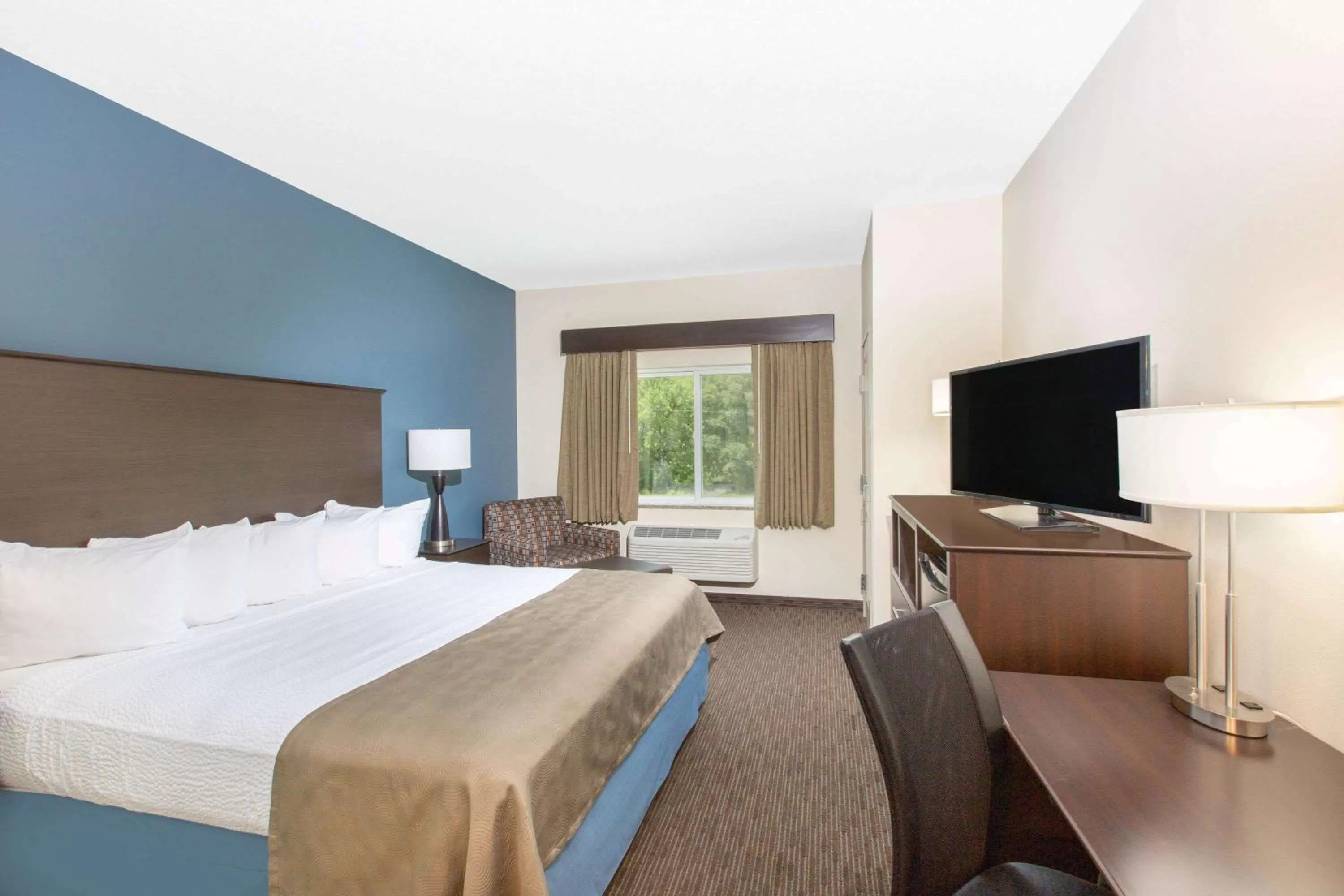 Photo of the whole room, Bed in AmericInn by Wyndham Humboldt