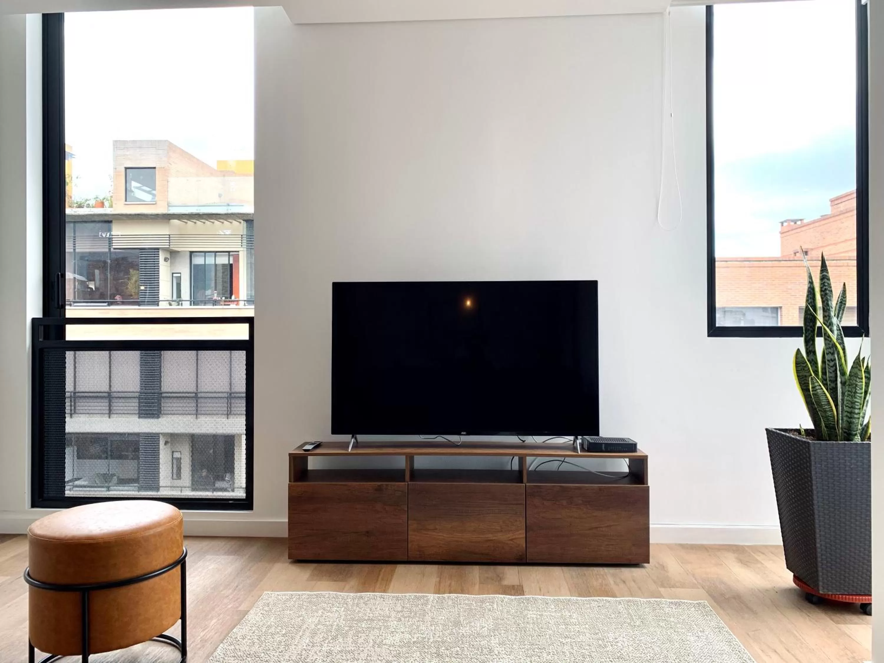 TV/Entertainment Center in Kubik apartments in Exclusive Virrey