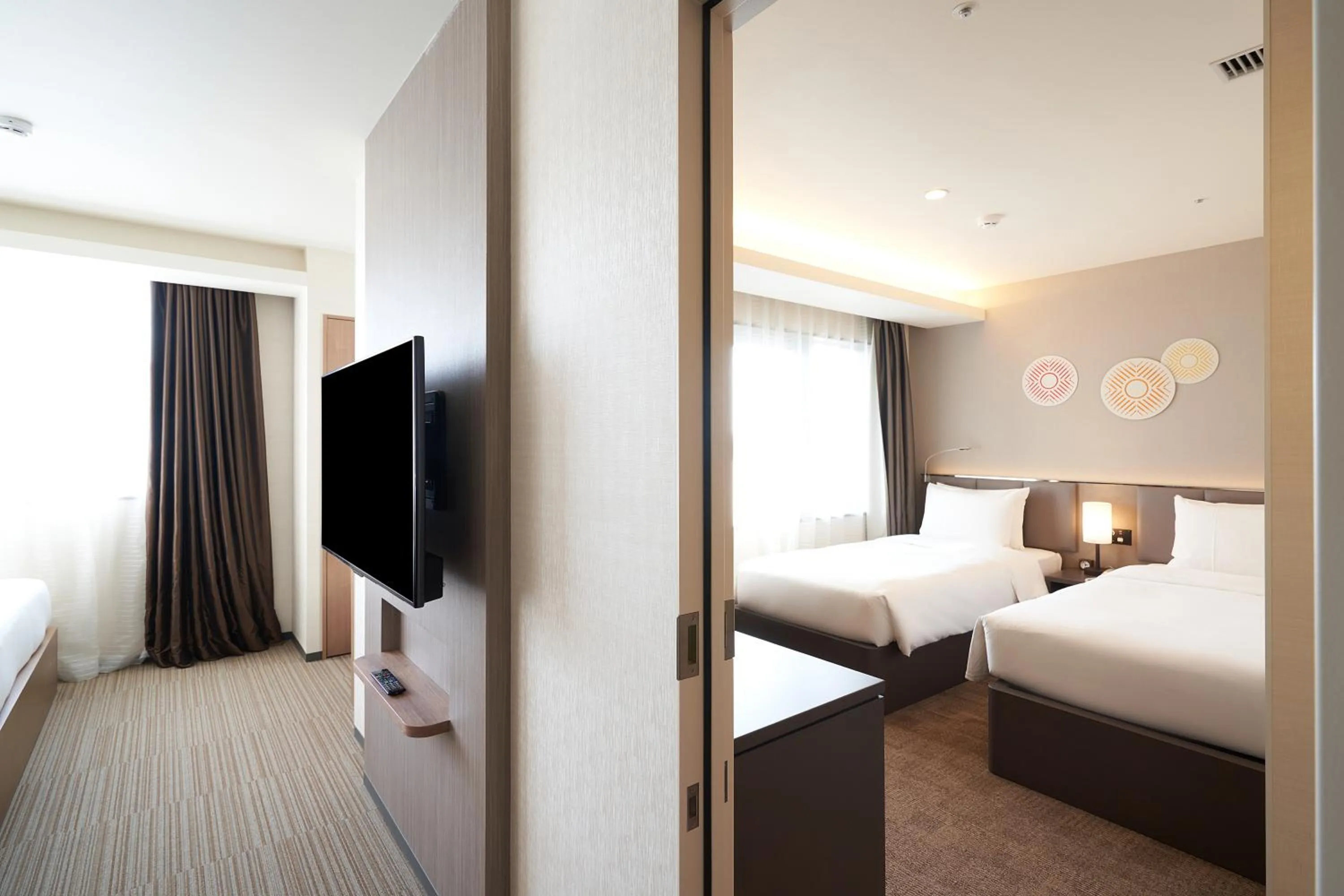 Photo of the whole room, Bed in Holiday Inn & Suites Shin Osaka by IHG