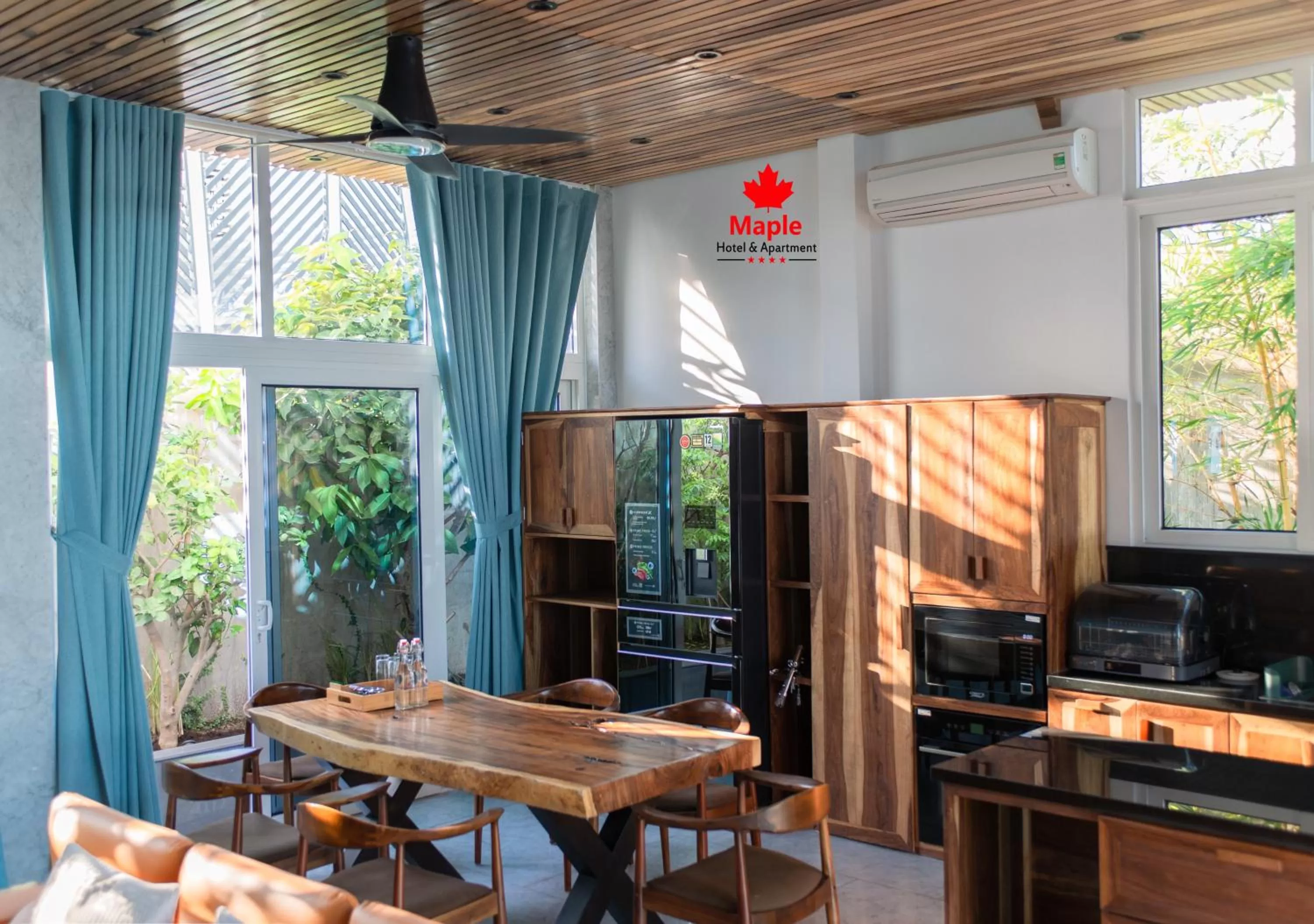 Living room in Maple Hotel & Apartment