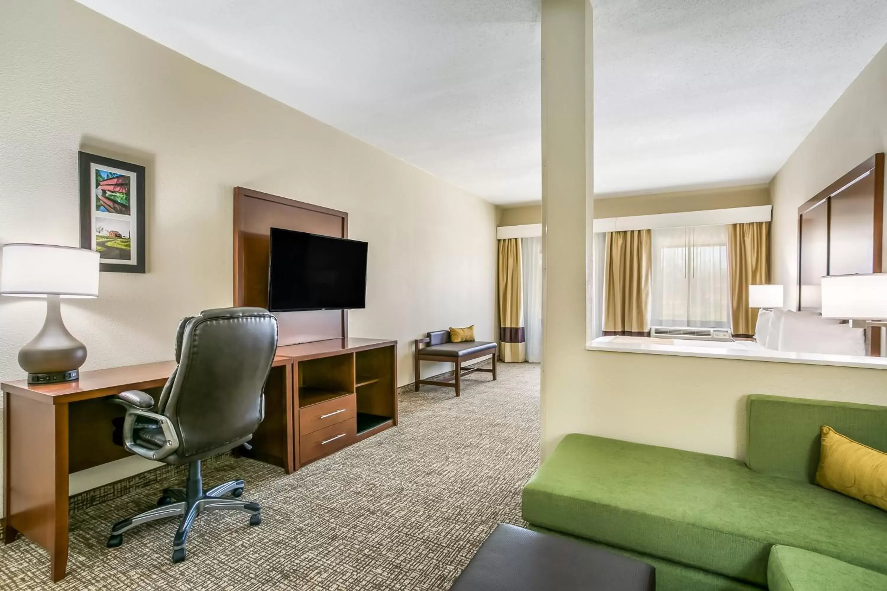 Bedroom, Seating Area in Aspire Hotel and Suites