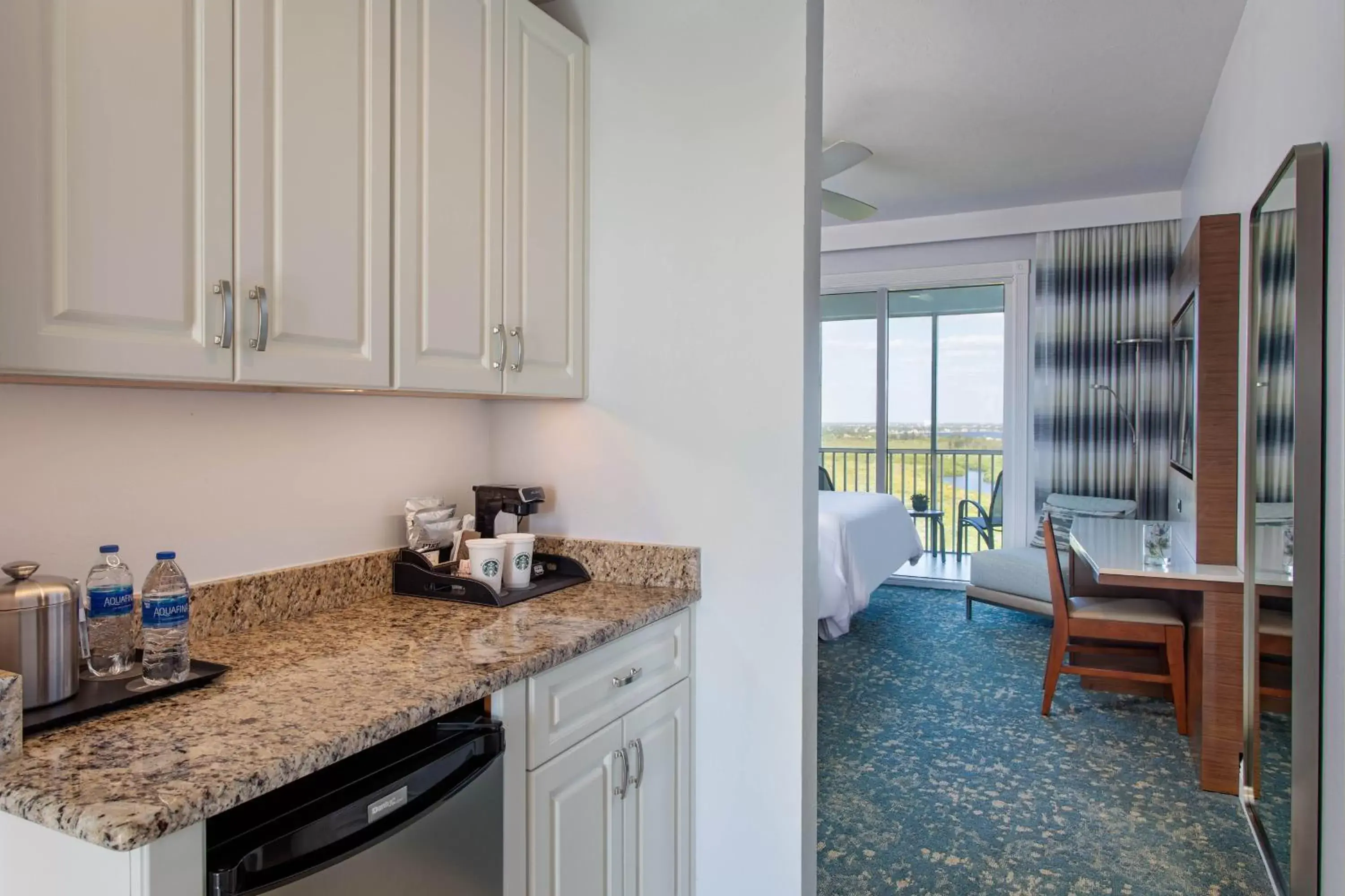 Photo of the whole room, Kitchen/Kitchenette in The Westin Cape Coral Resort at Marina Village