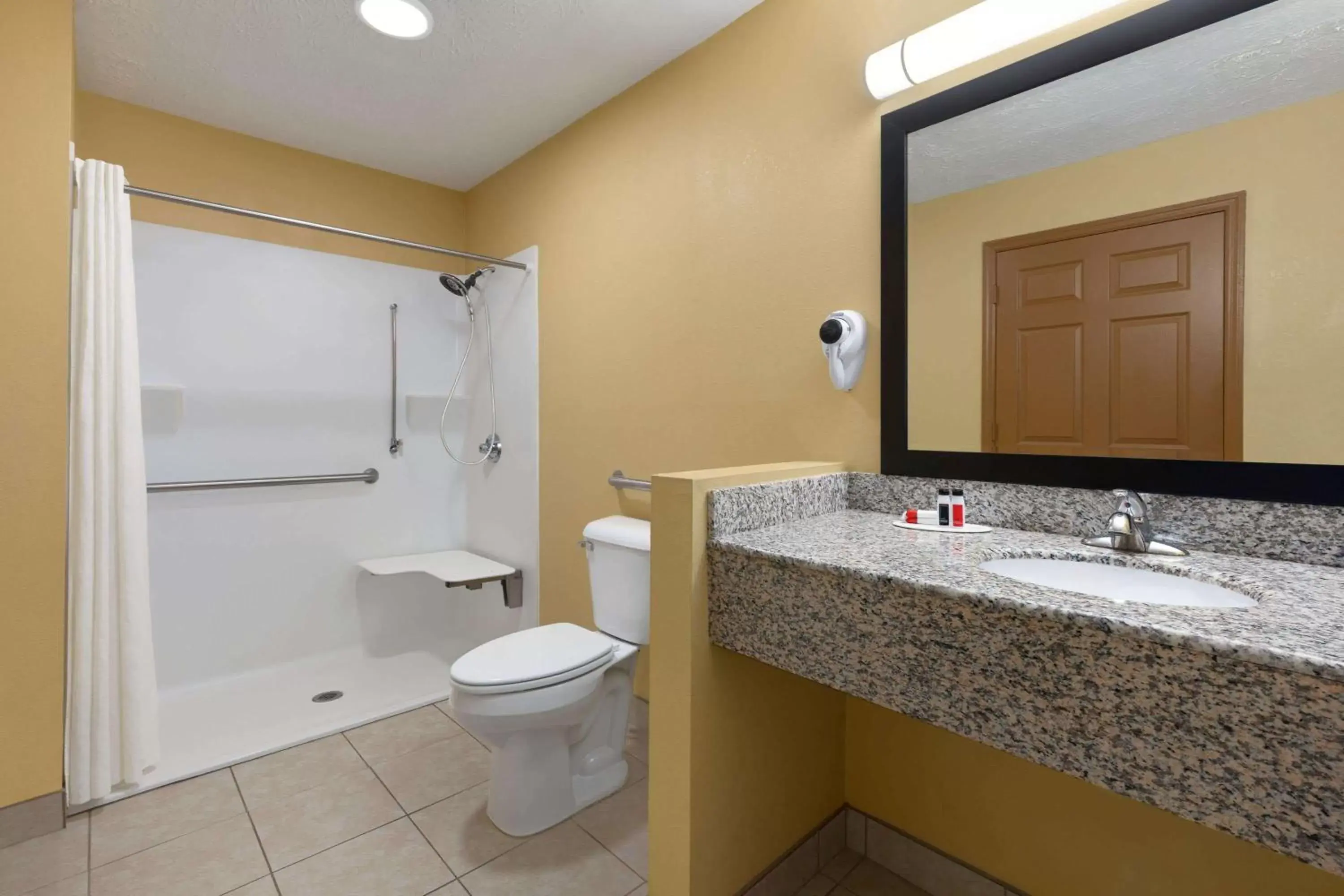 Bathroom in Super 8 by Wyndham Whites Creek/ Nashville NW Area