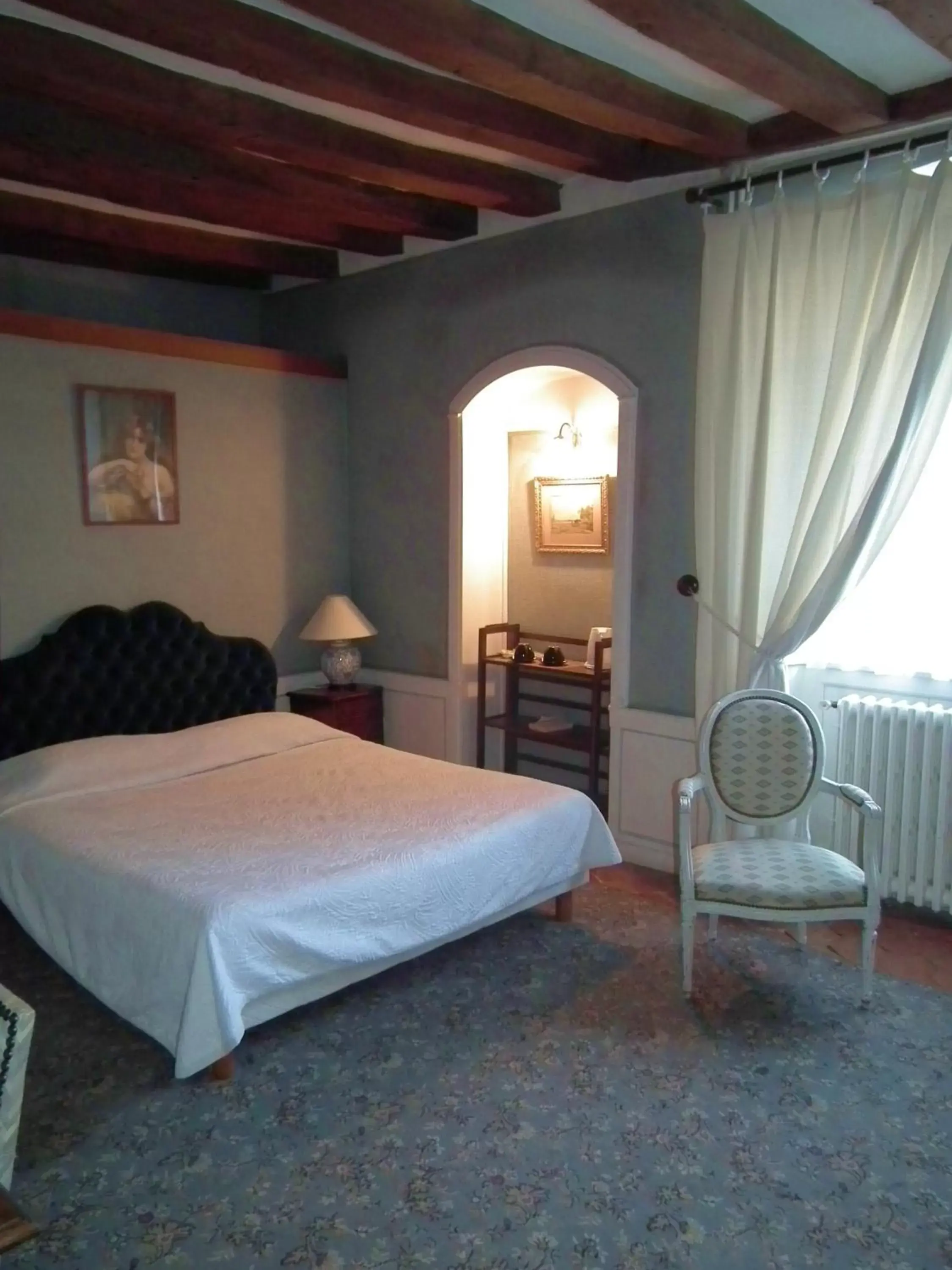 Bed in Le Relais Cicero