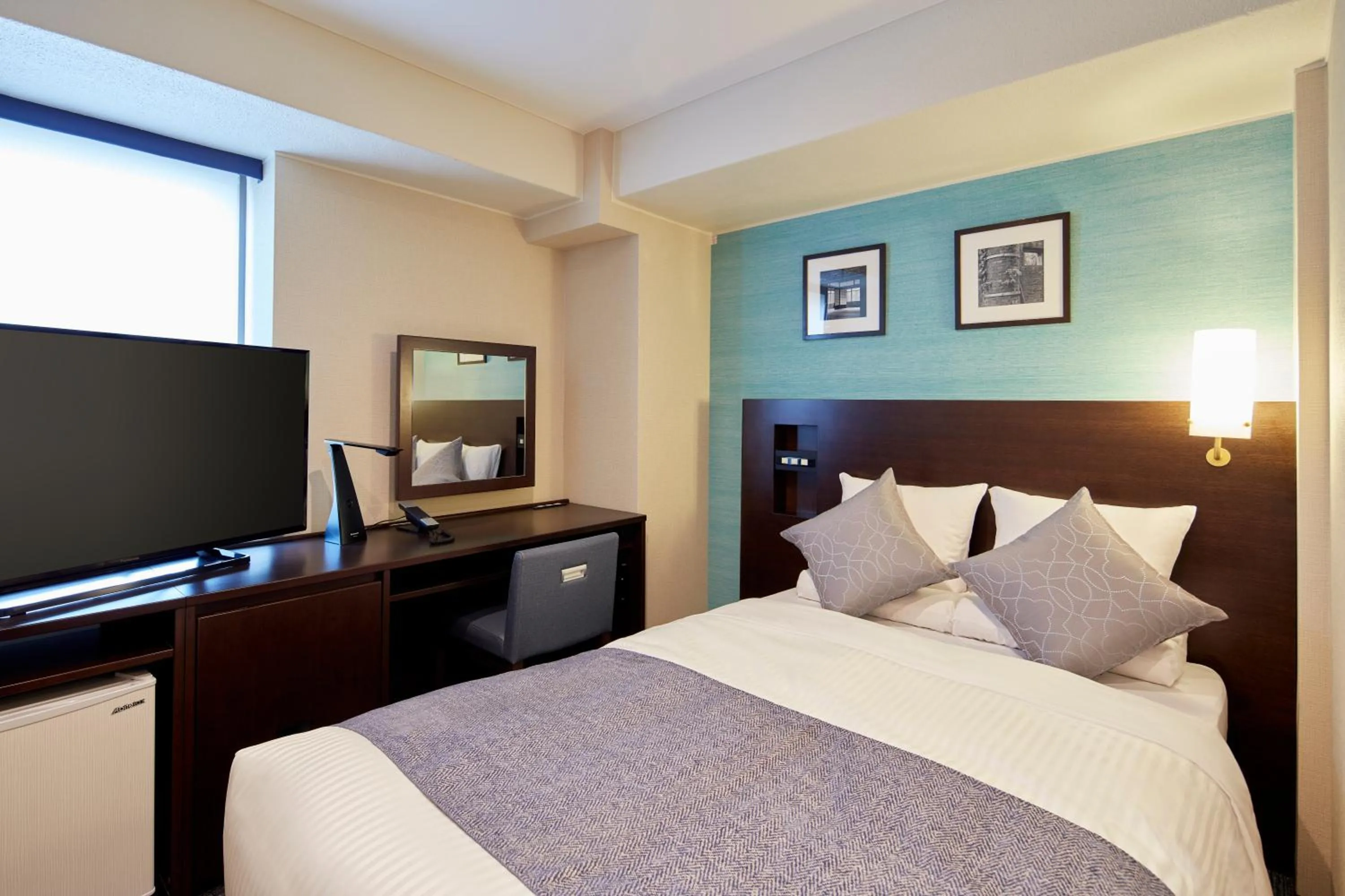 Bed in HOTEL MYSTAYS Yokohama