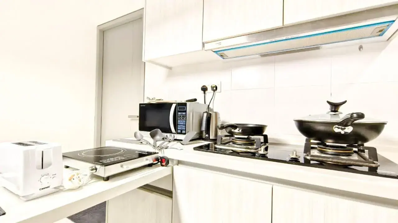 Kitchen/Kitchenette in 1 Tebrau Suites by Subhome