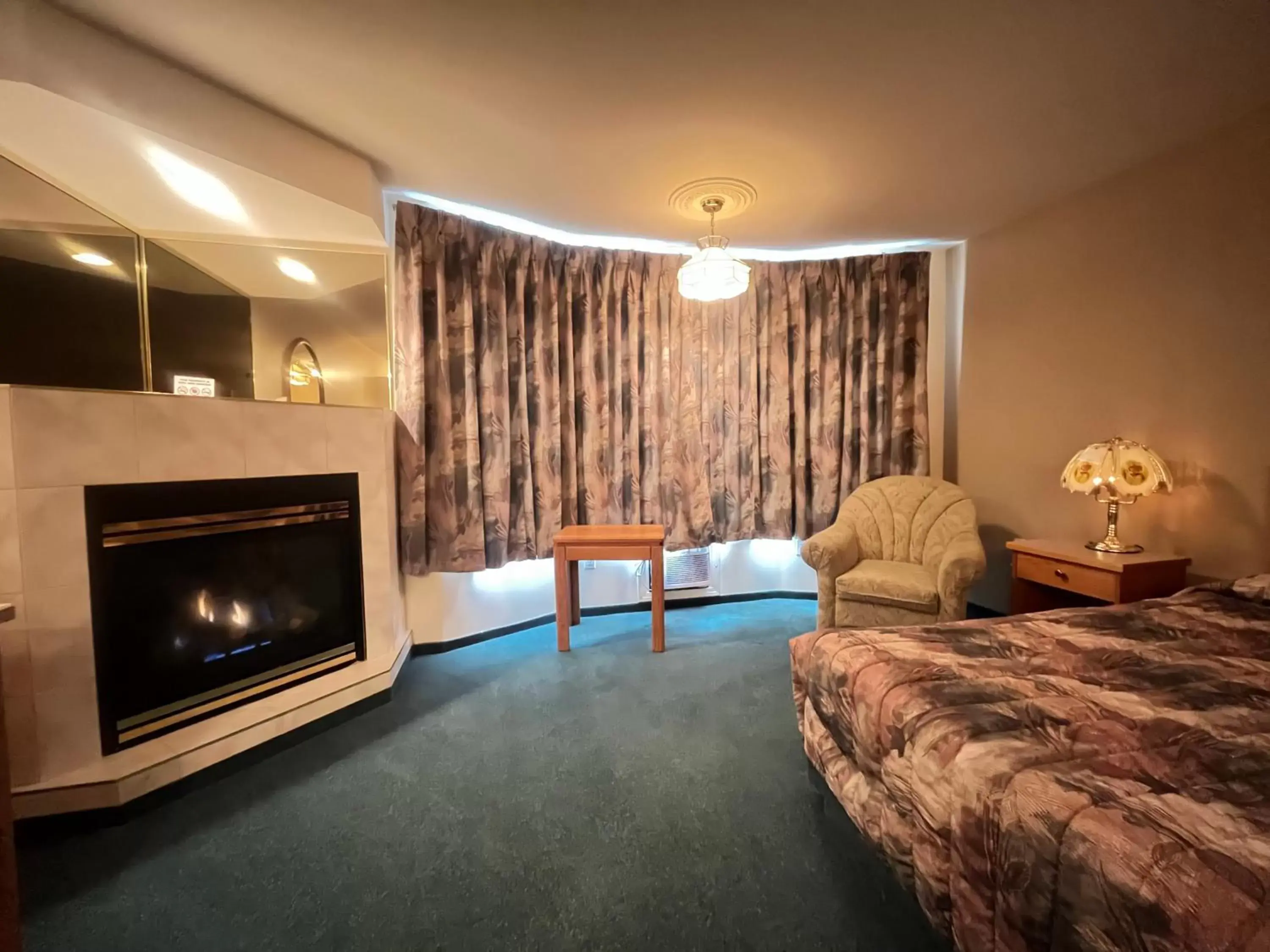 flat iron, TV/Entertainment Center in Western Budget Motel #3 Whitecourt