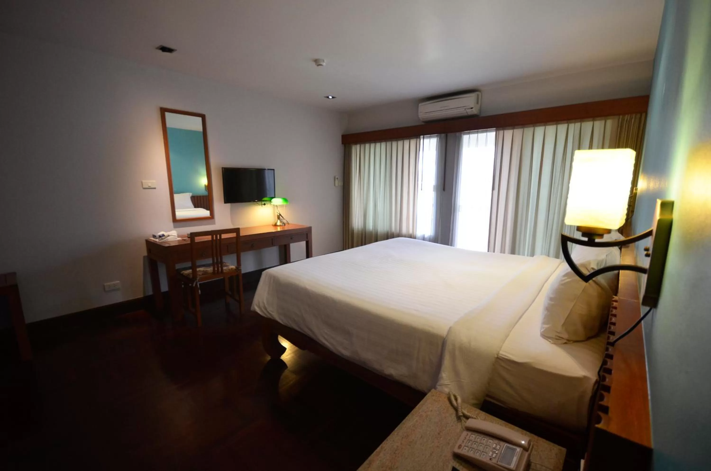 Photo of the whole room, Bed in Sakorn Residence and Hotel