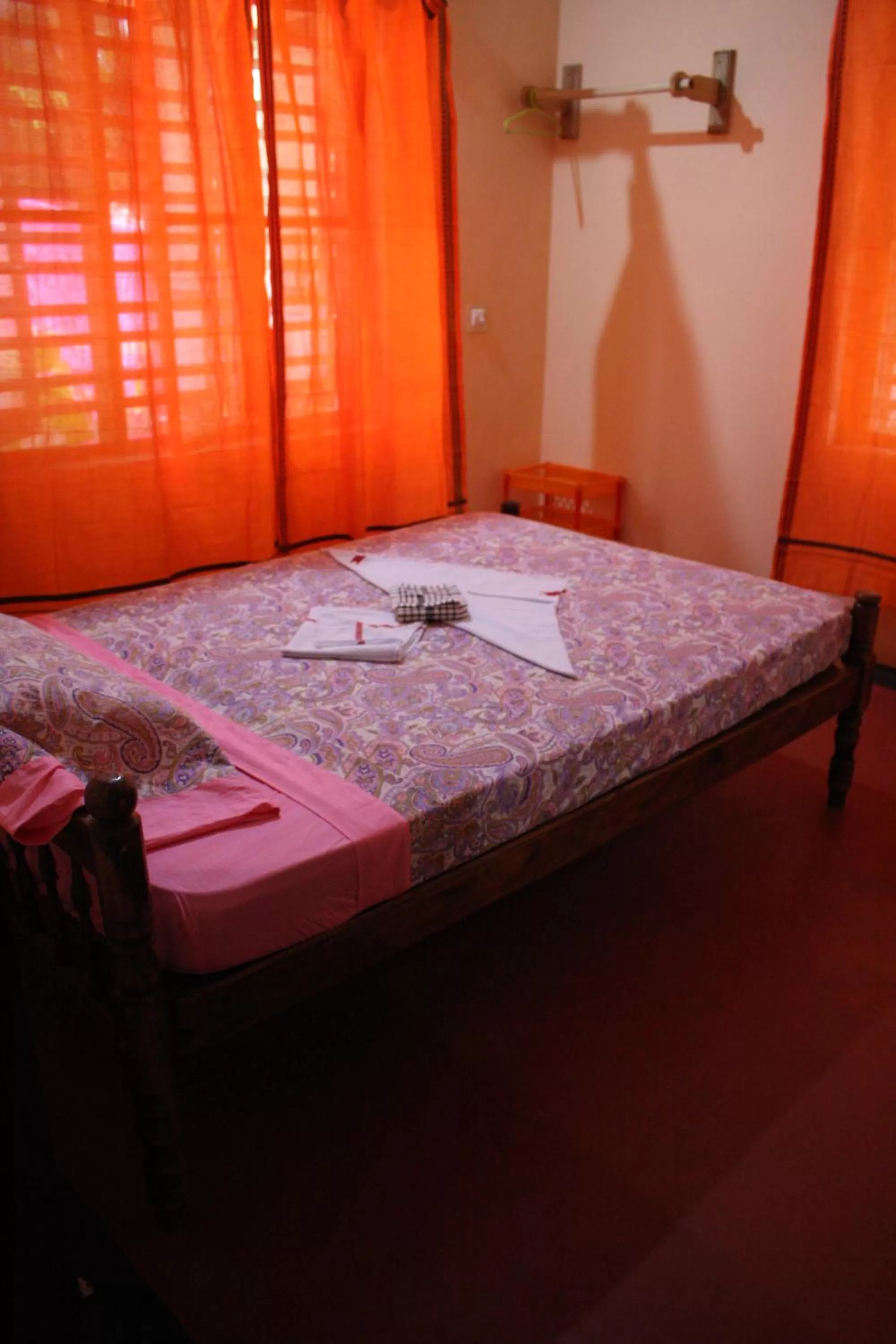 Bed in Sukriti beach Resort