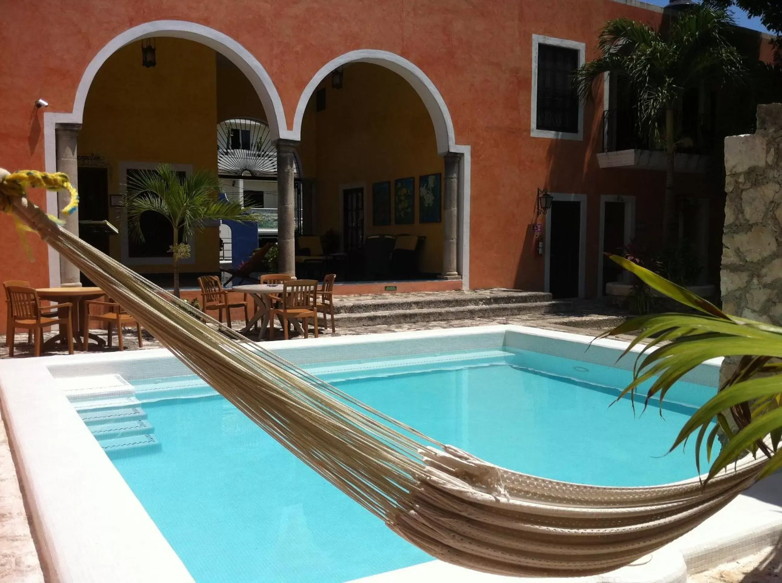 Property building, Swimming Pool in Hotel Casa de las Flores