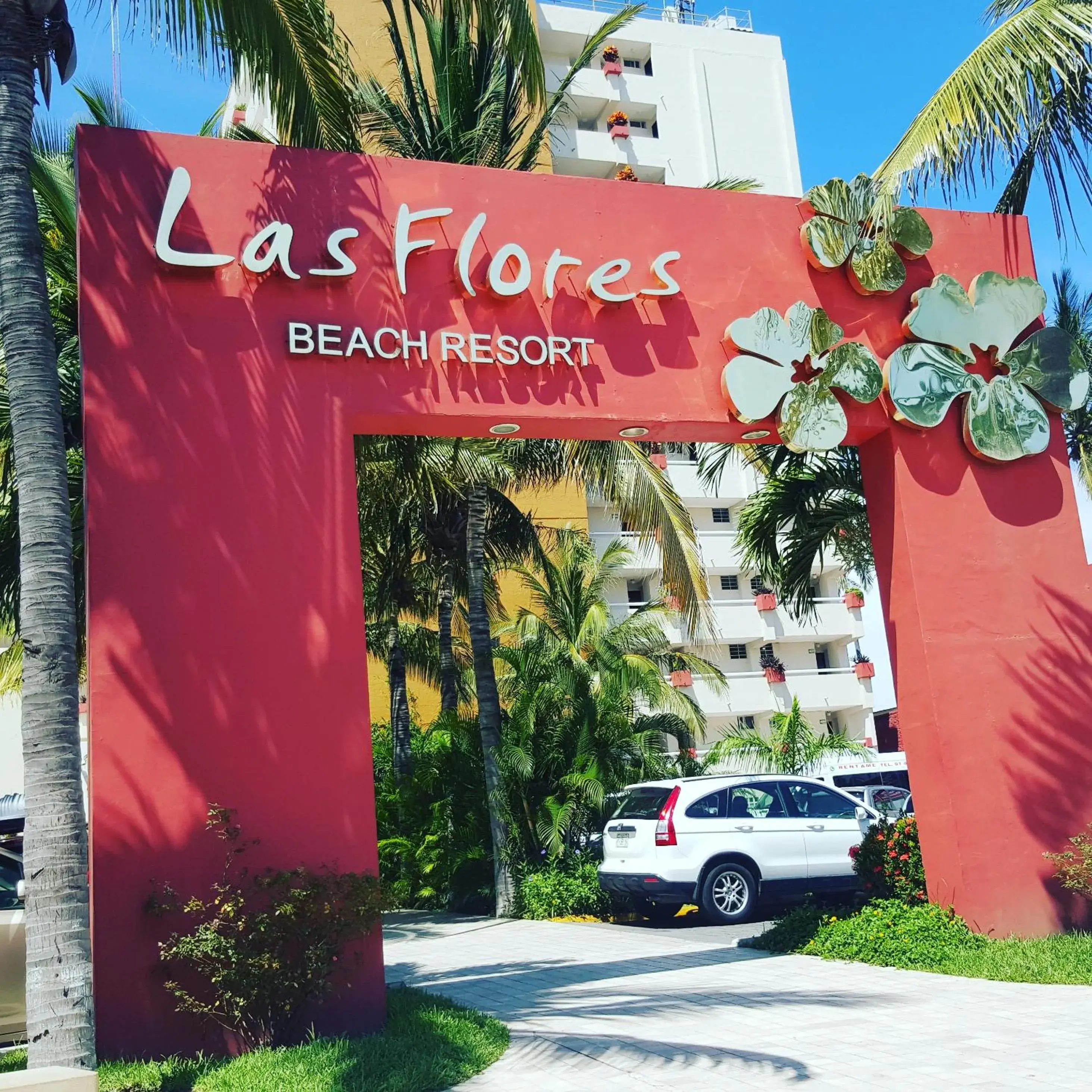 Property building in Las Flores Beach Resort Property building in Las Flores Beach Resort