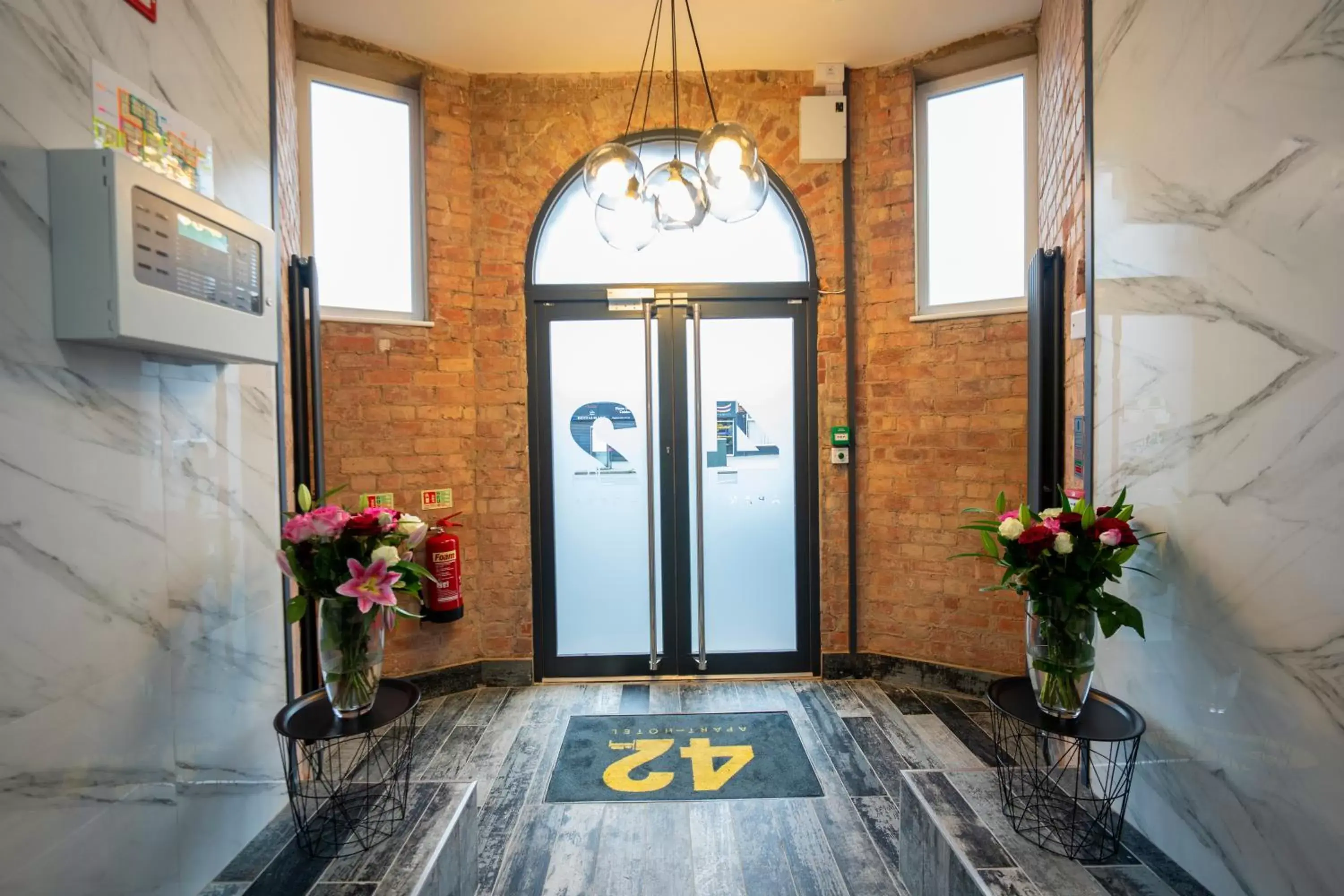 Lobby or reception in 42 Apart-Hotel